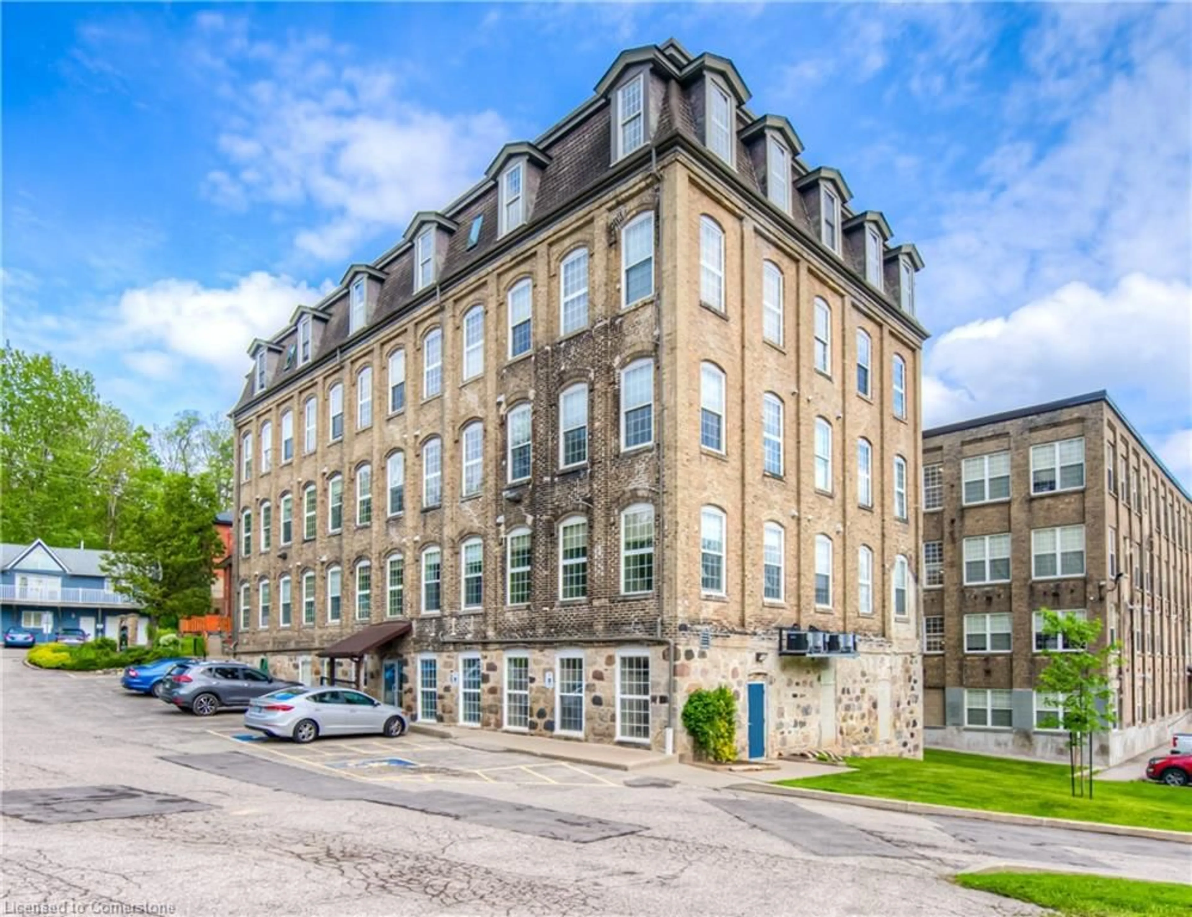 A pic from outside/outdoor area/front of a property/back of a property/a pic from drone, building for 140 West River St #203, Paris Ontario N3L 3E2
