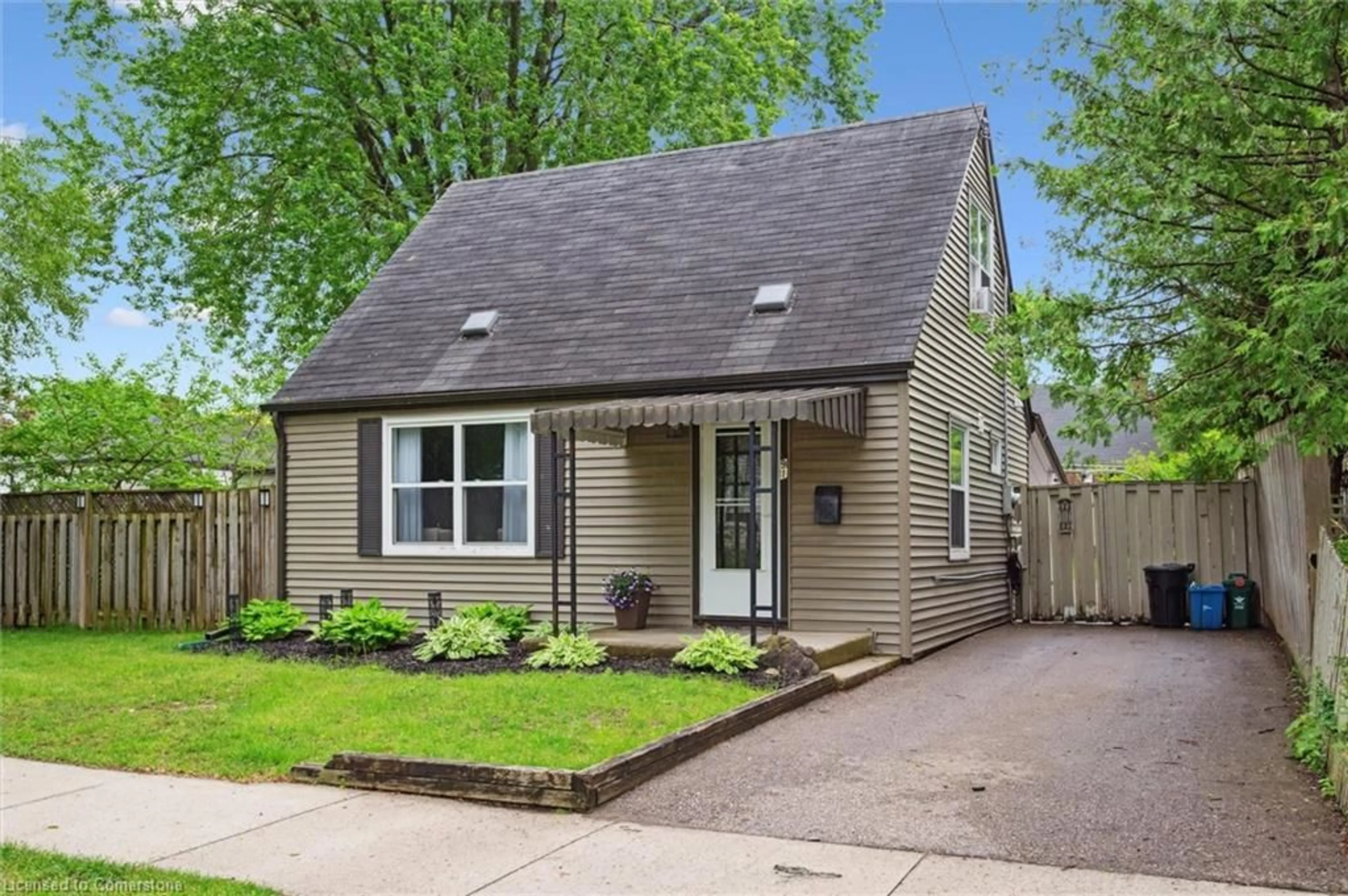 Home with vinyl exterior material, street for 91 Glen Rd, Kitchener Ontario N2M 3E9