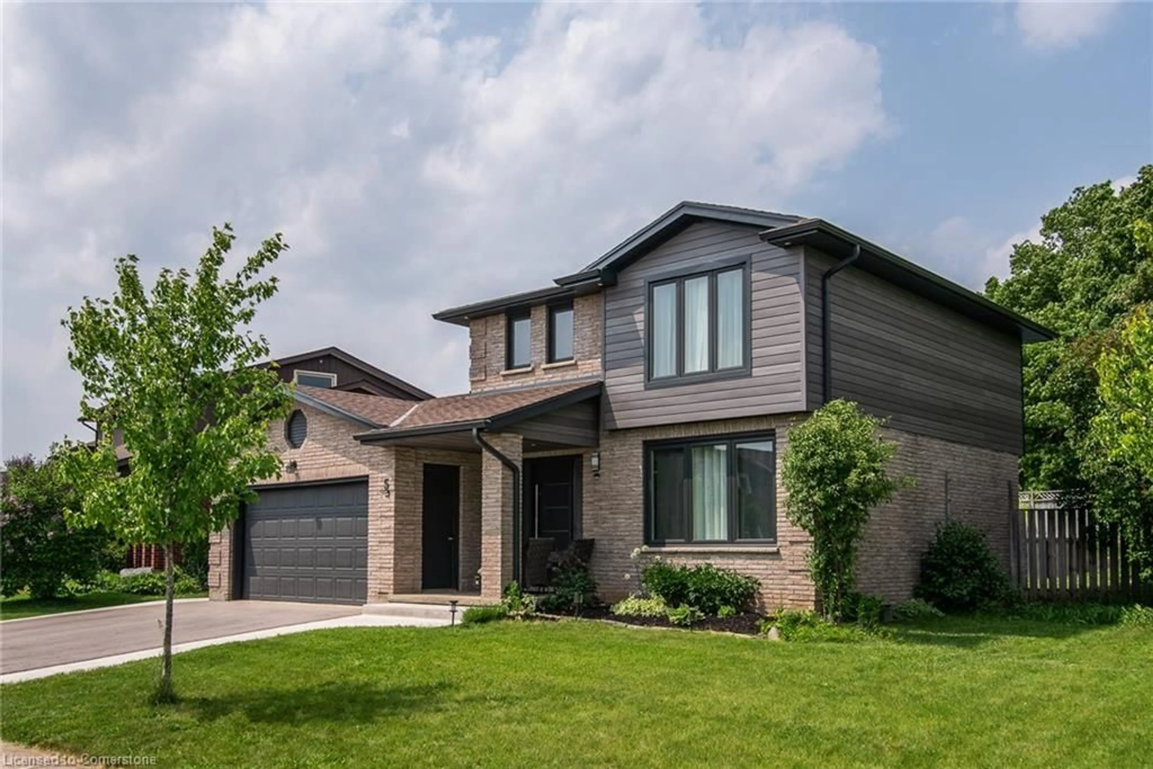 Home with brick exterior material, street for 5 Greenwich Dr, Guelph Ontario N1H 8A8