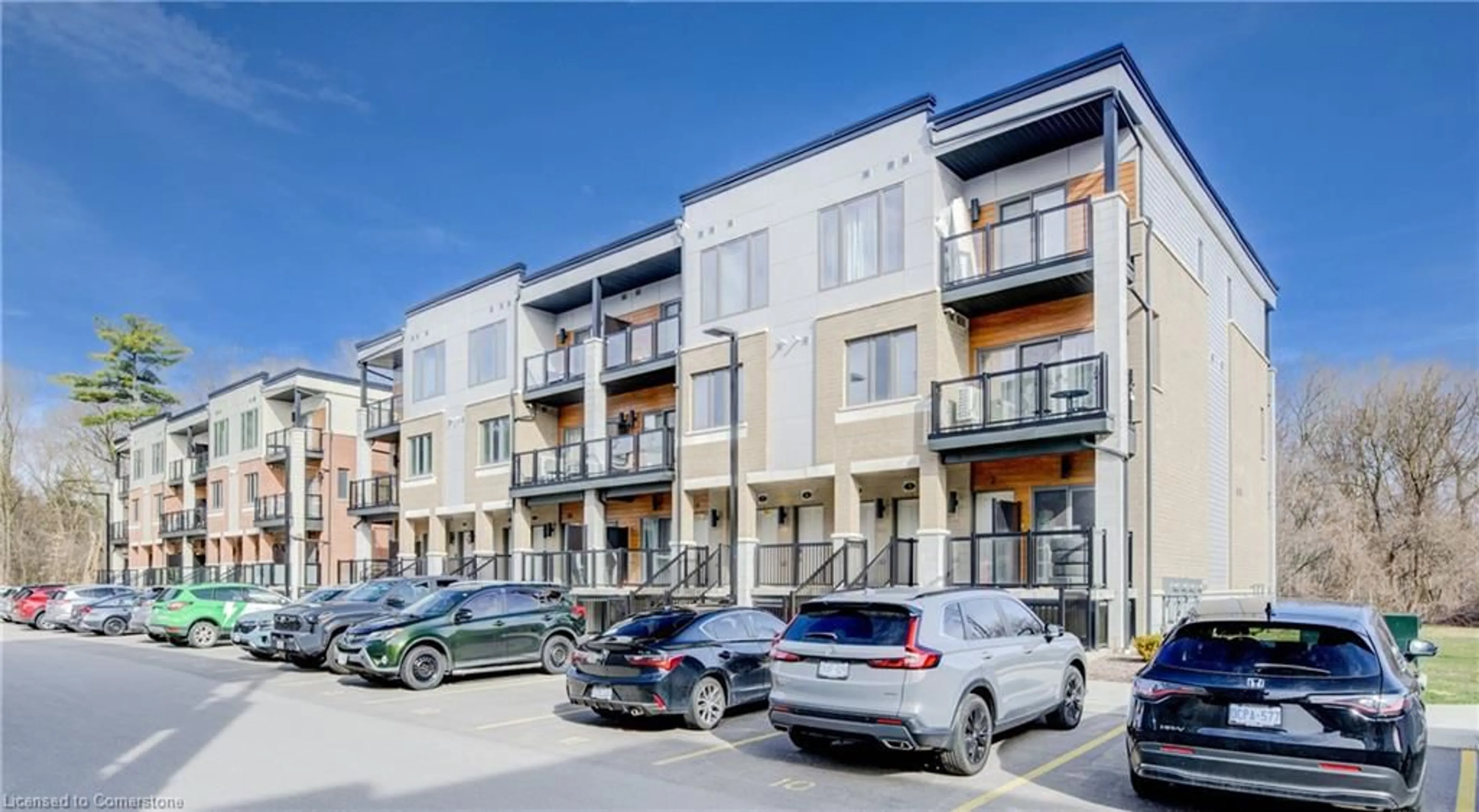 A pic from outside/outdoor area/front of a property/back of a property/a pic from drone, street for 25 Isherwood Ave #A1, Cambridge Ontario N1R 0E2