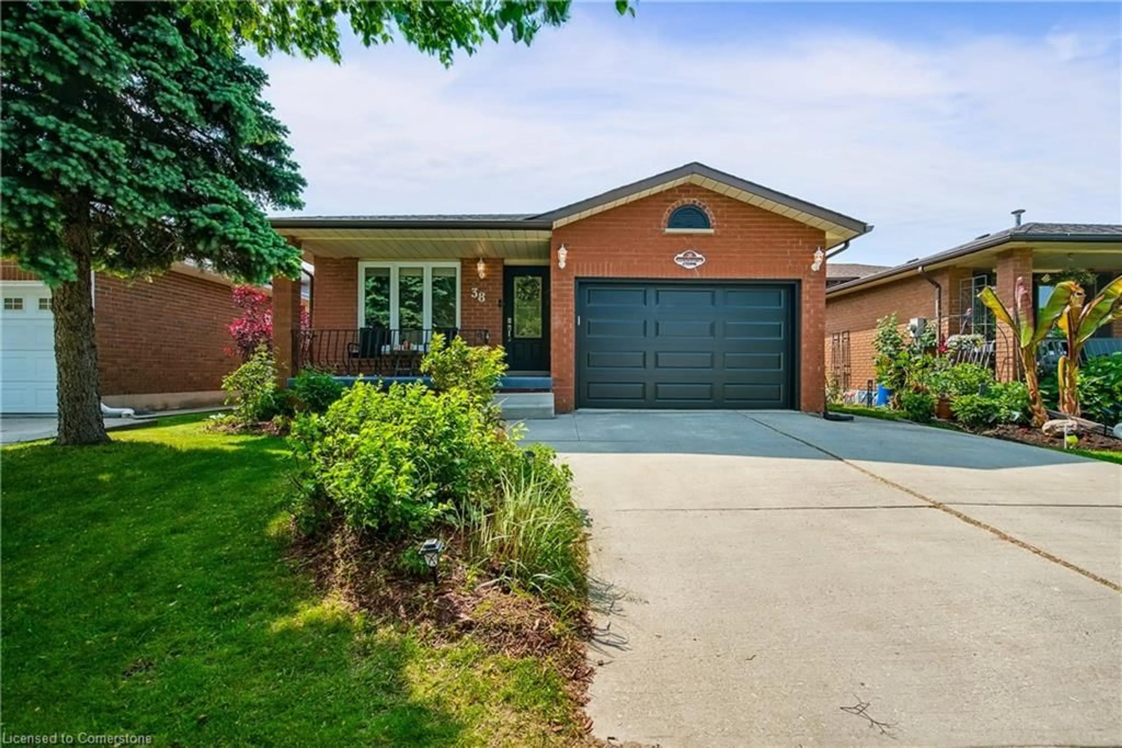 Home with brick exterior material, street for 38 Pinewoods Dr, Hamilton Ontario L8J 2T5