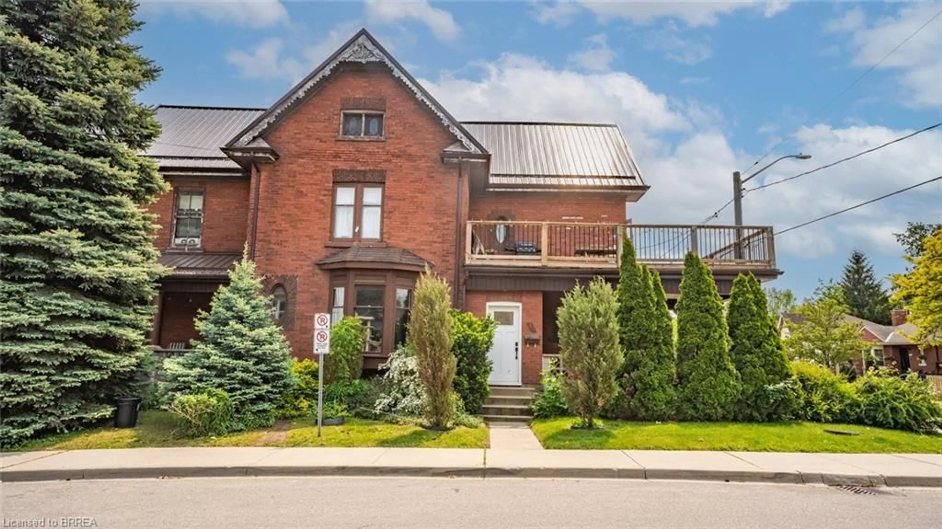 Home with brick exterior material, street for 65 Victoria St, Brantford Ontario N3S 3K3