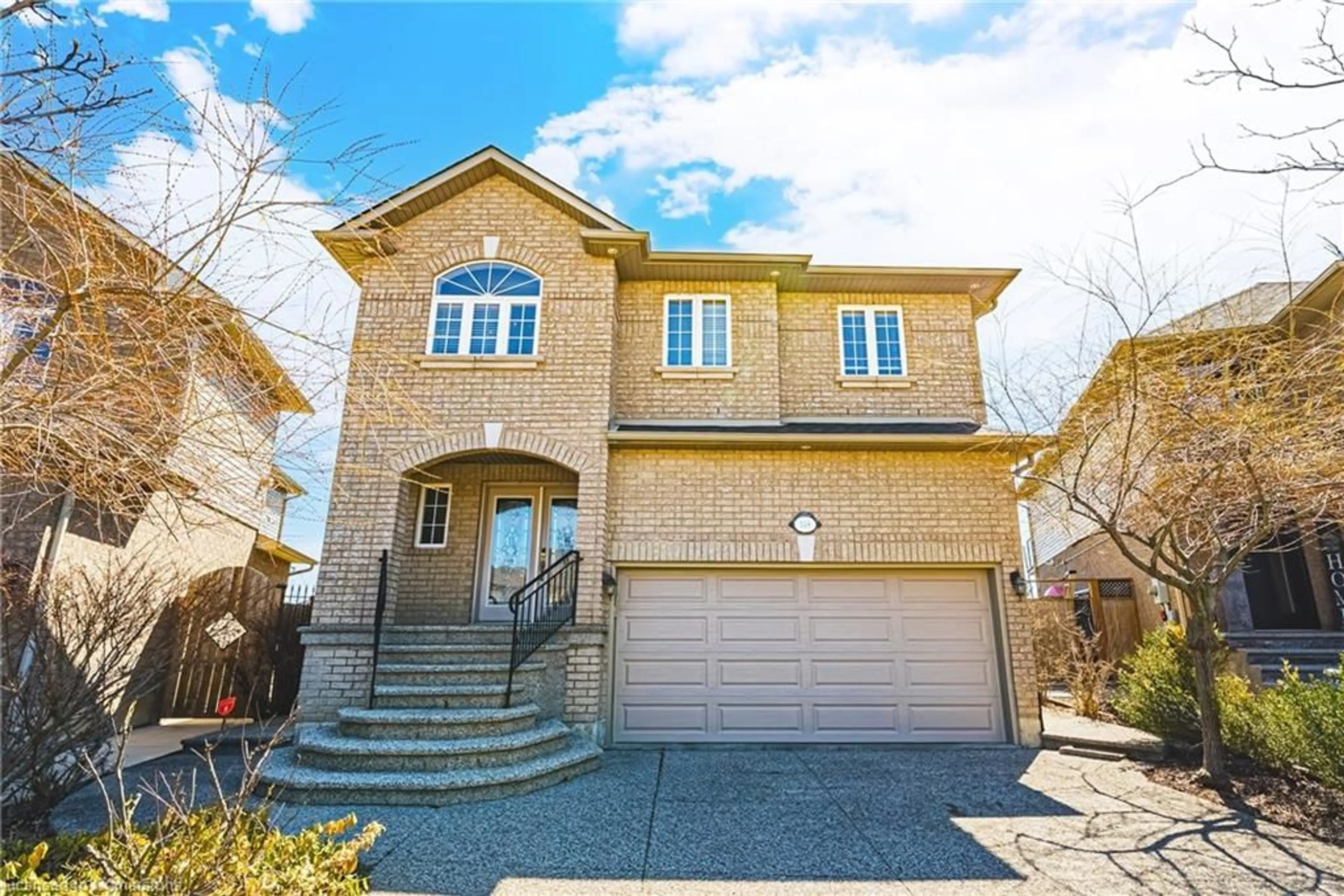 Home with brick exterior material, street for 148 Meadow Wood Cres, Stoney Creek Ontario L8J 3Z8