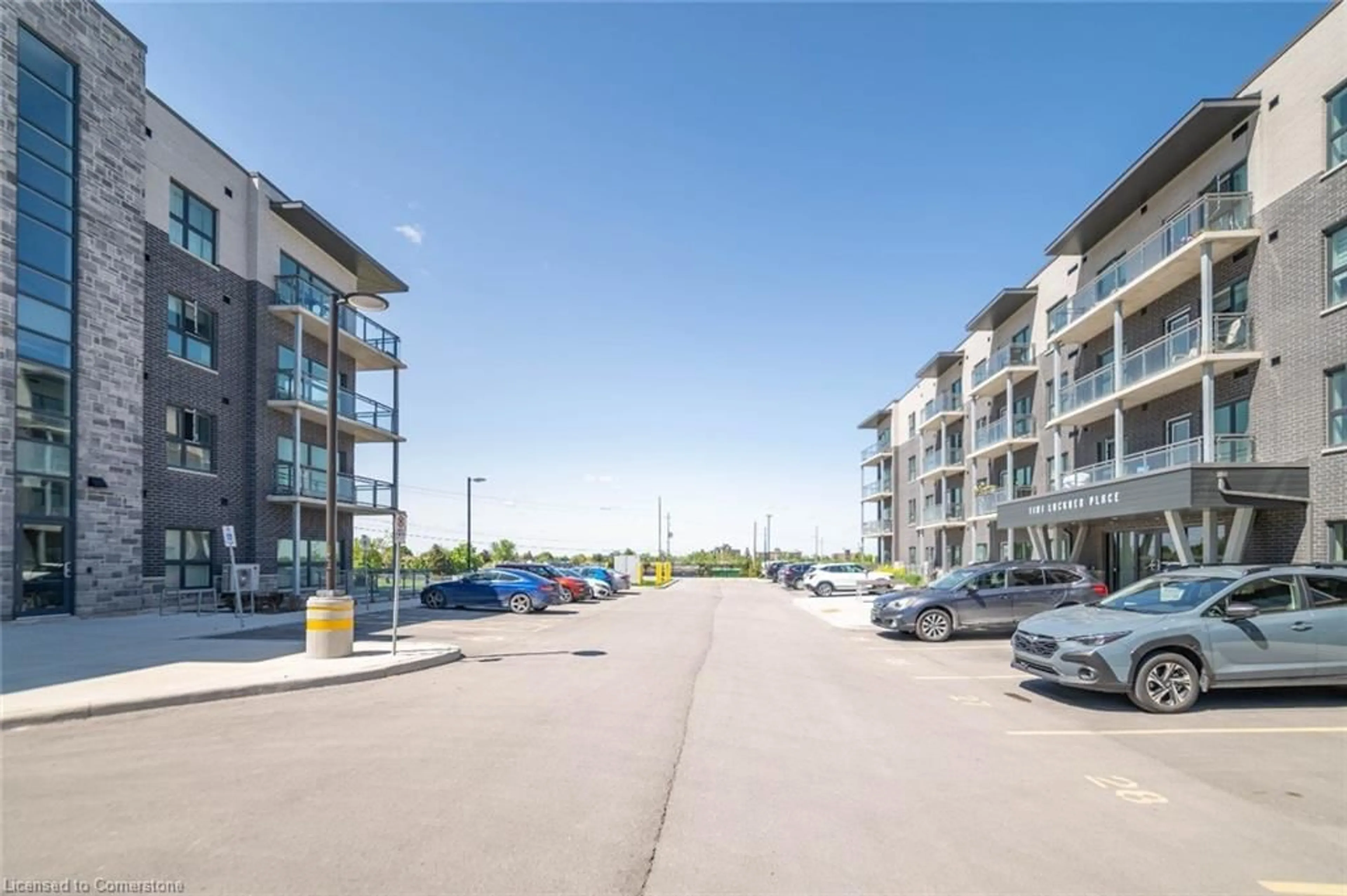 A pic from outside/outdoor area/front of a property/back of a property/a pic from drone, street for 1201 Lackner Pl #102, Kitchener Ontario N2A 0L4