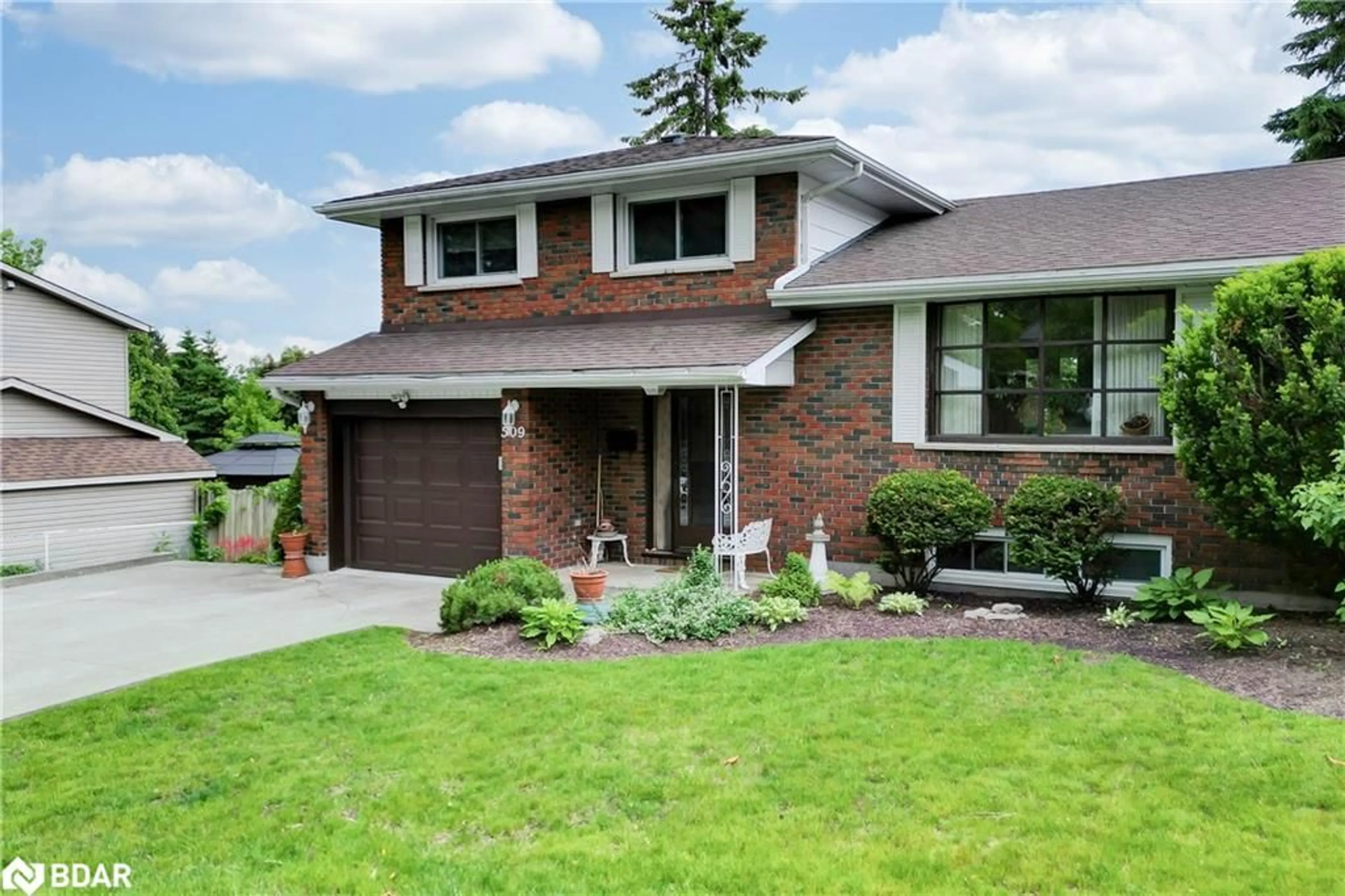 Home with brick exterior material, street for 509 Montcalm Dr, Peterborough Ontario K9H 6S9