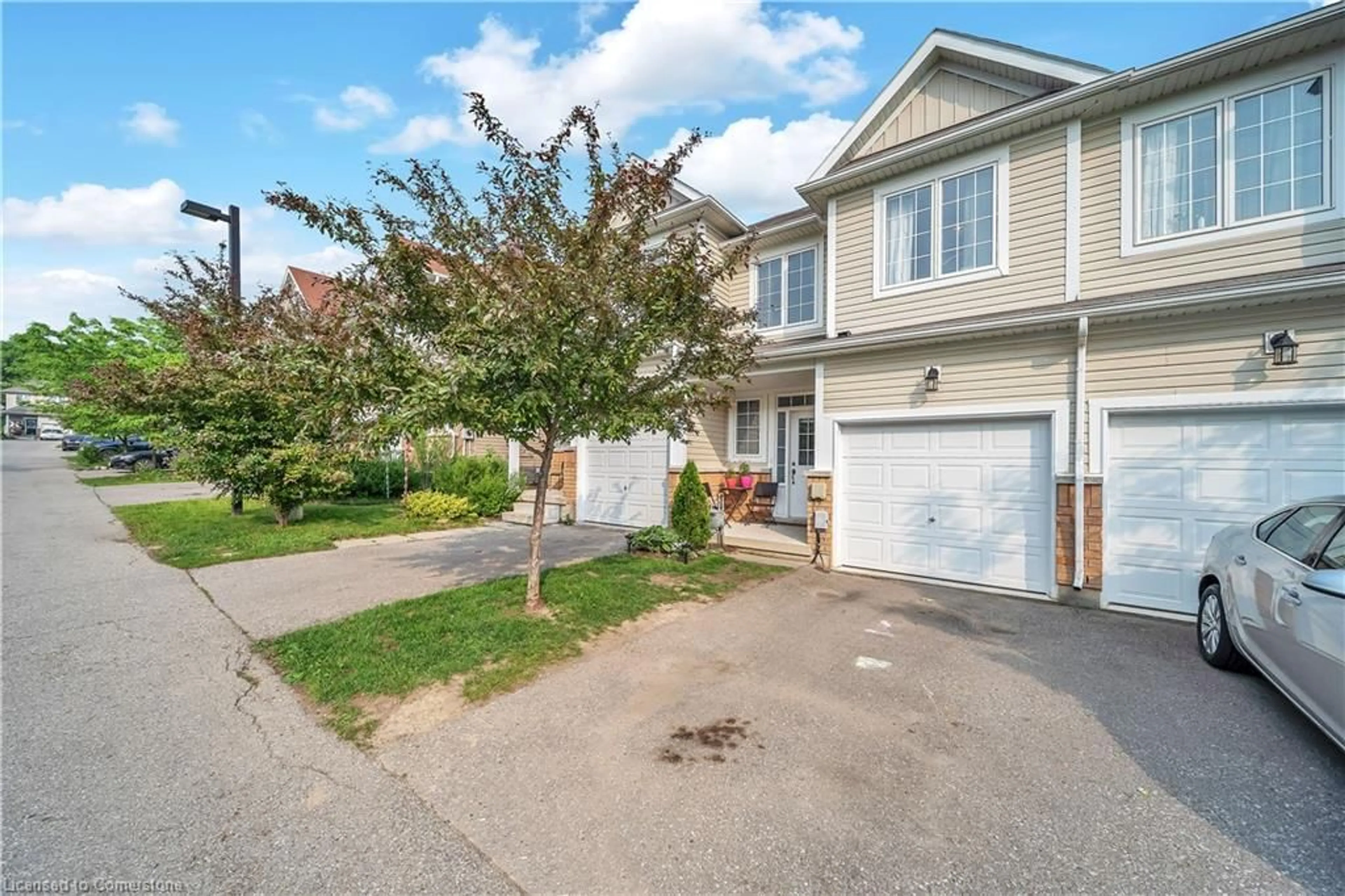A pic from outside/outdoor area/front of a property/back of a property/a pic from drone, street for 21 Diana Ave #135, Brantford Ontario N3T 0G7