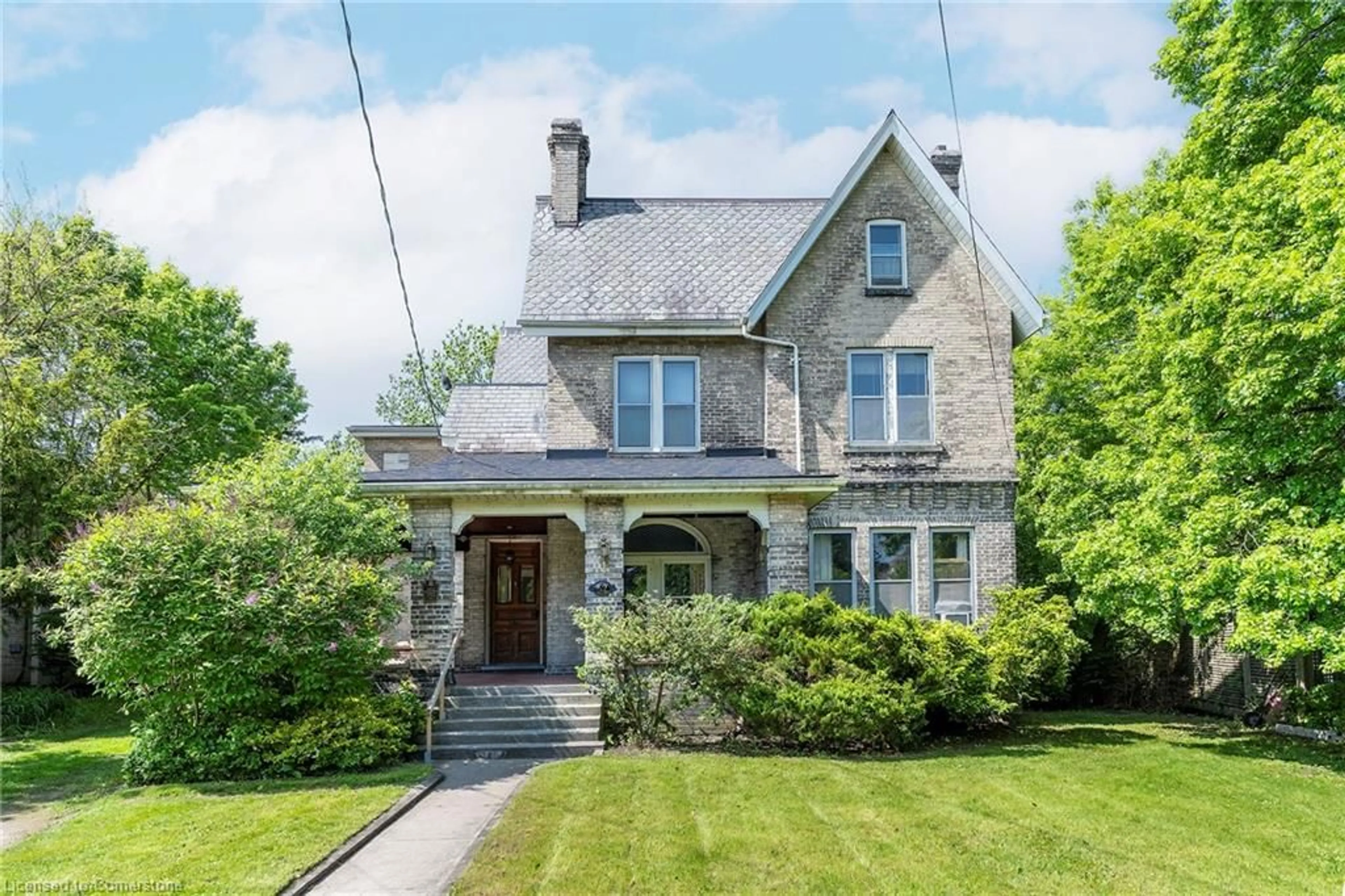 Home with brick exterior material, street for 52 Lorne Cres, Brantford Ontario N3T 4L7
