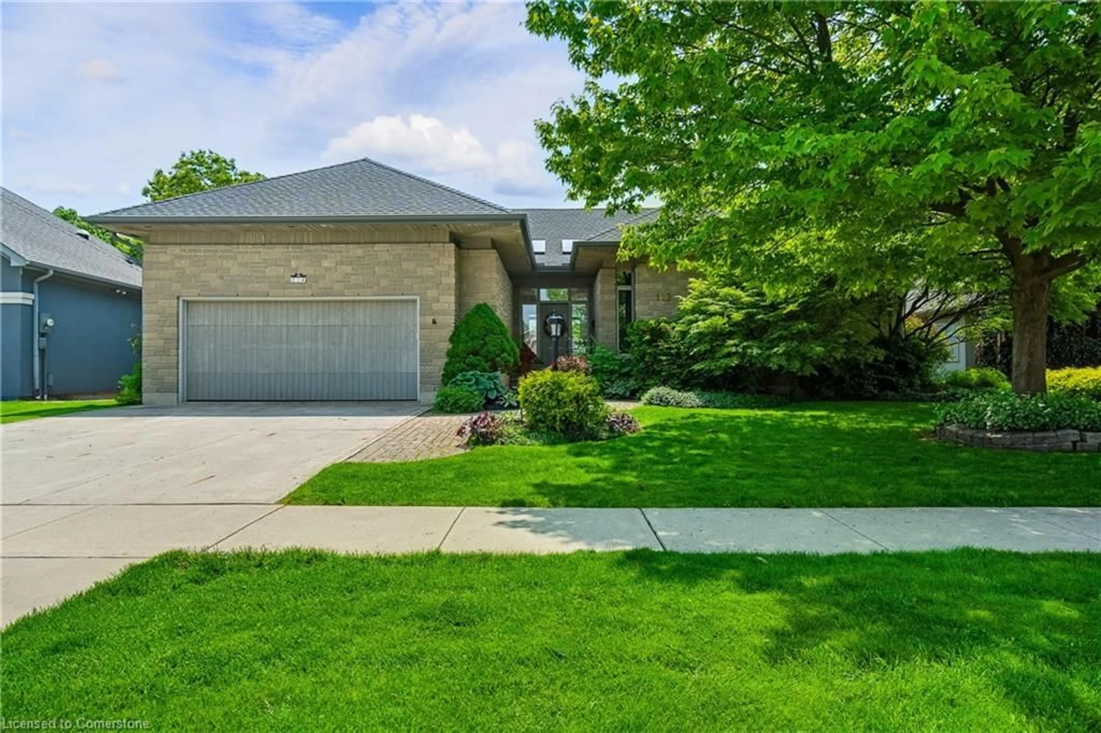 Home with brick exterior material, street for 128 Grindstone Way, Dundas Ontario L9H 7B8