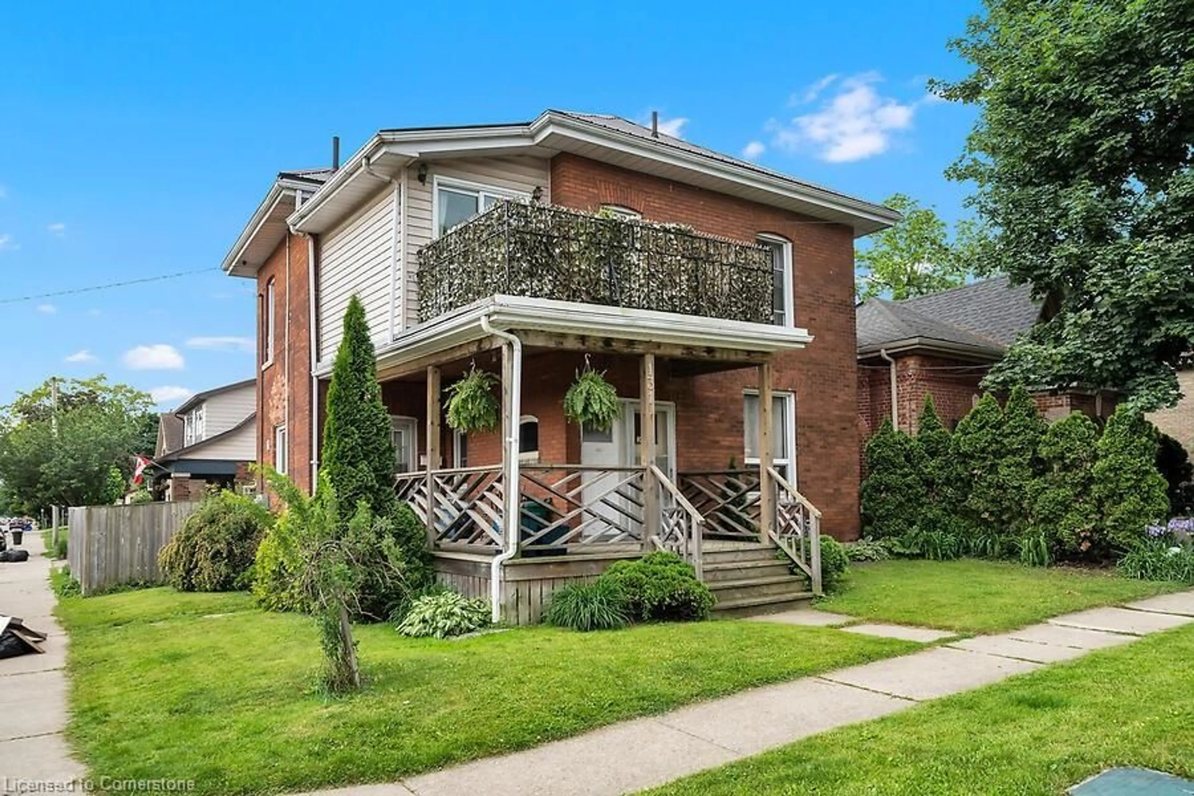Home with brick exterior material, street for 131 East Ave, Brantford Ontario N3S 3M1