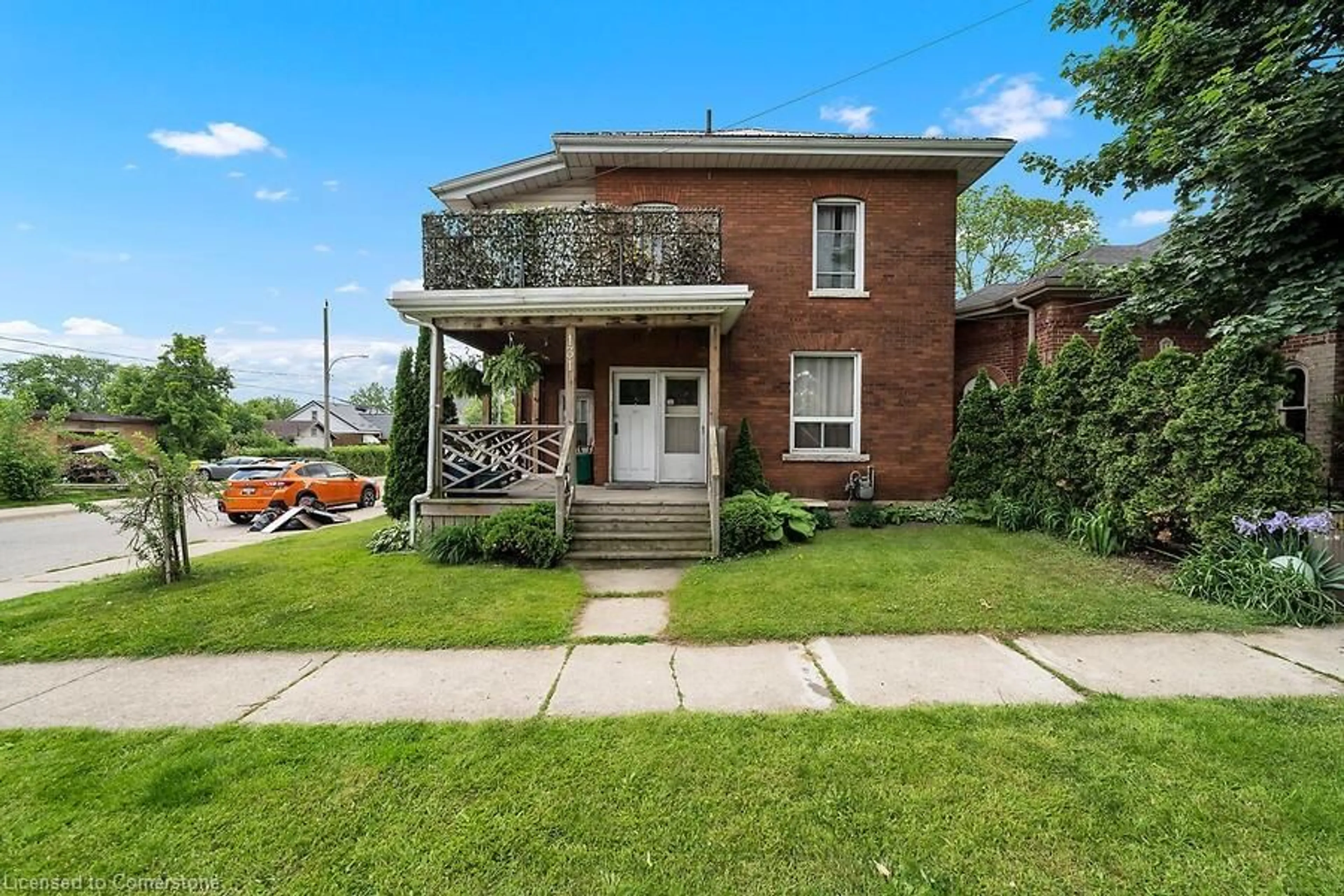 Home with brick exterior material, street for 131 East Ave, Brantford Ontario N3S 3M1