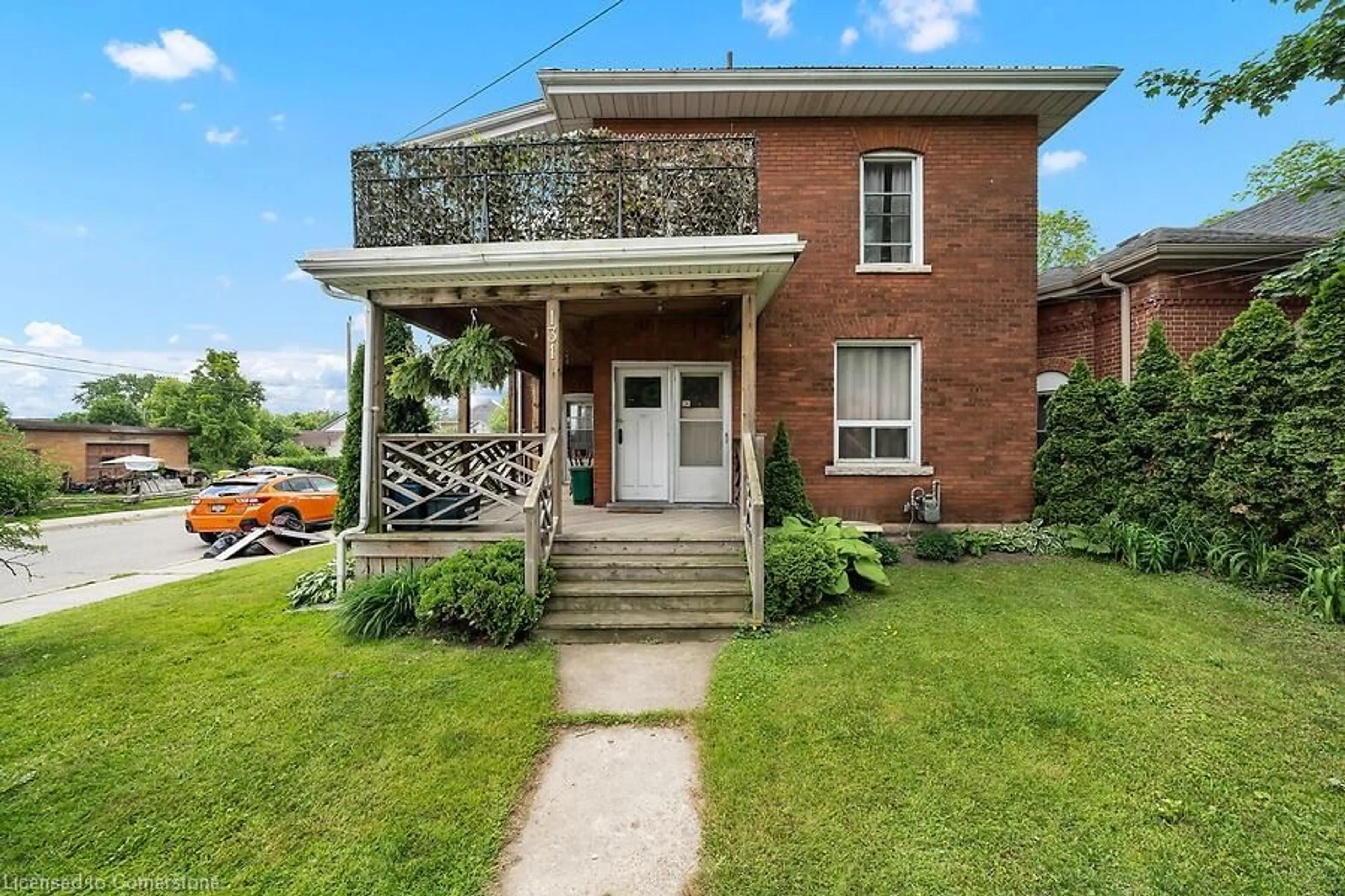 Home with brick exterior material, street for 131 East Ave, Brantford Ontario N3S 3M1