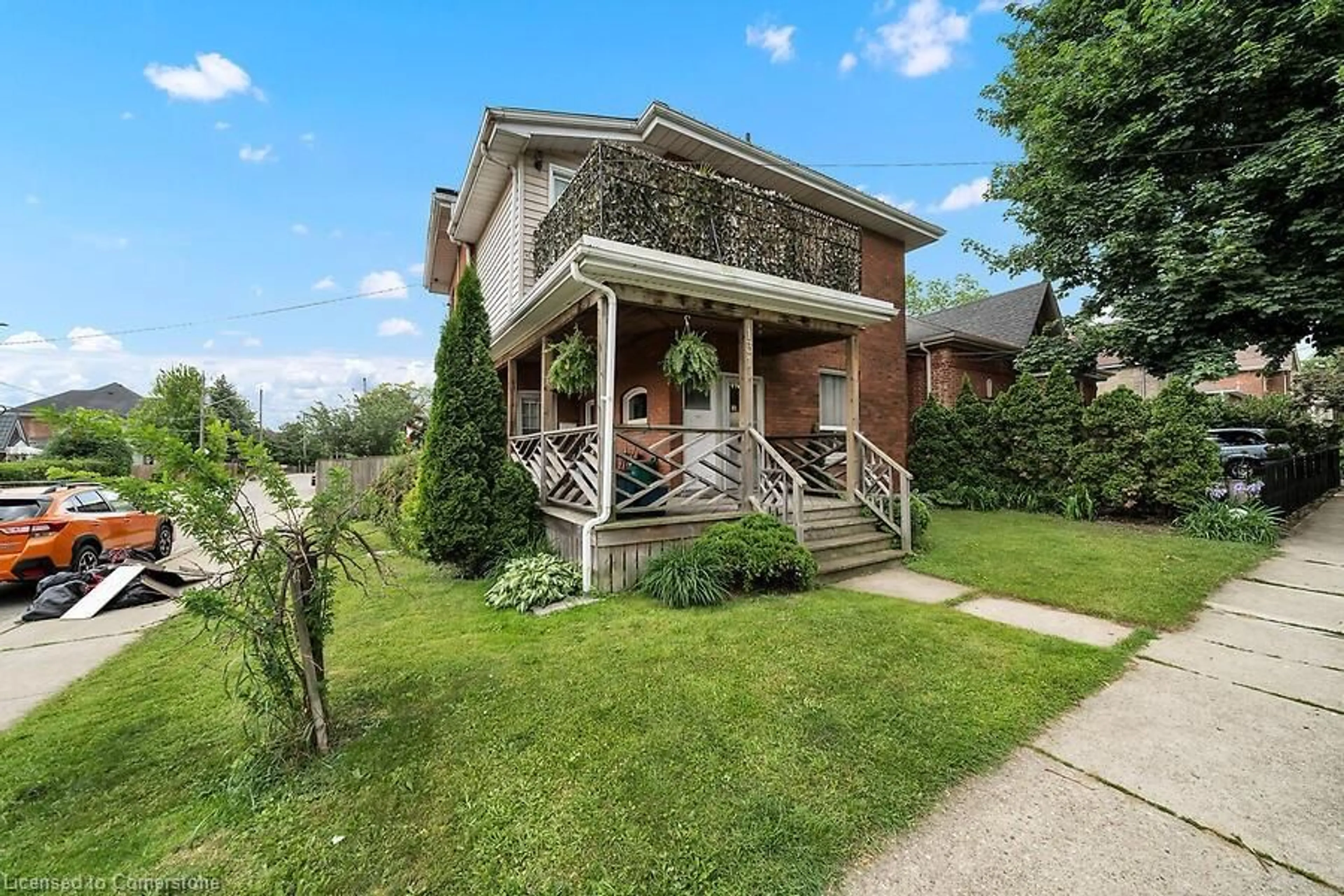 Home with brick exterior material, street for 131 East Ave, Brantford Ontario N3S 3M1