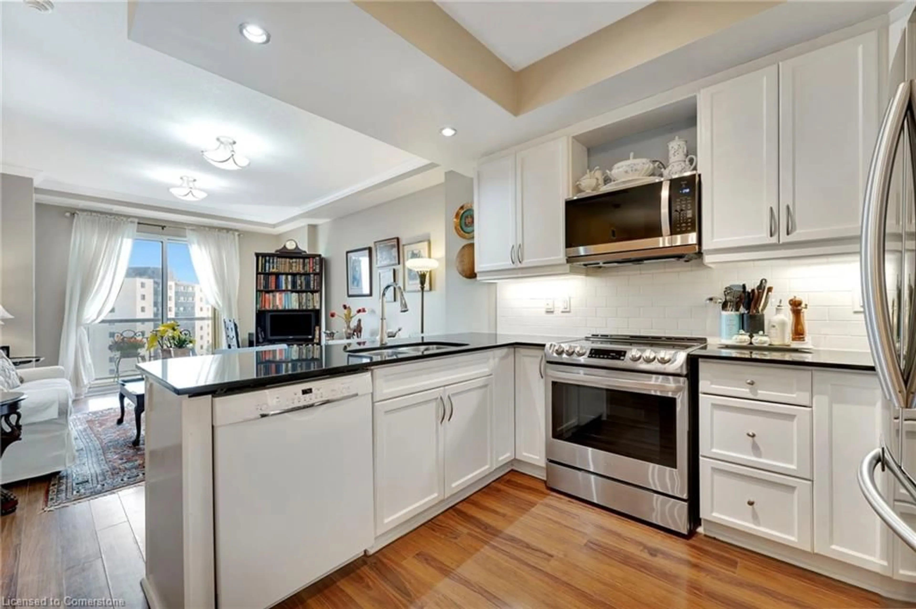 Open concept kitchen, ceramic/tile floor for 539 Belmont Ave #906, Kitchener Ontario N2M 0A2