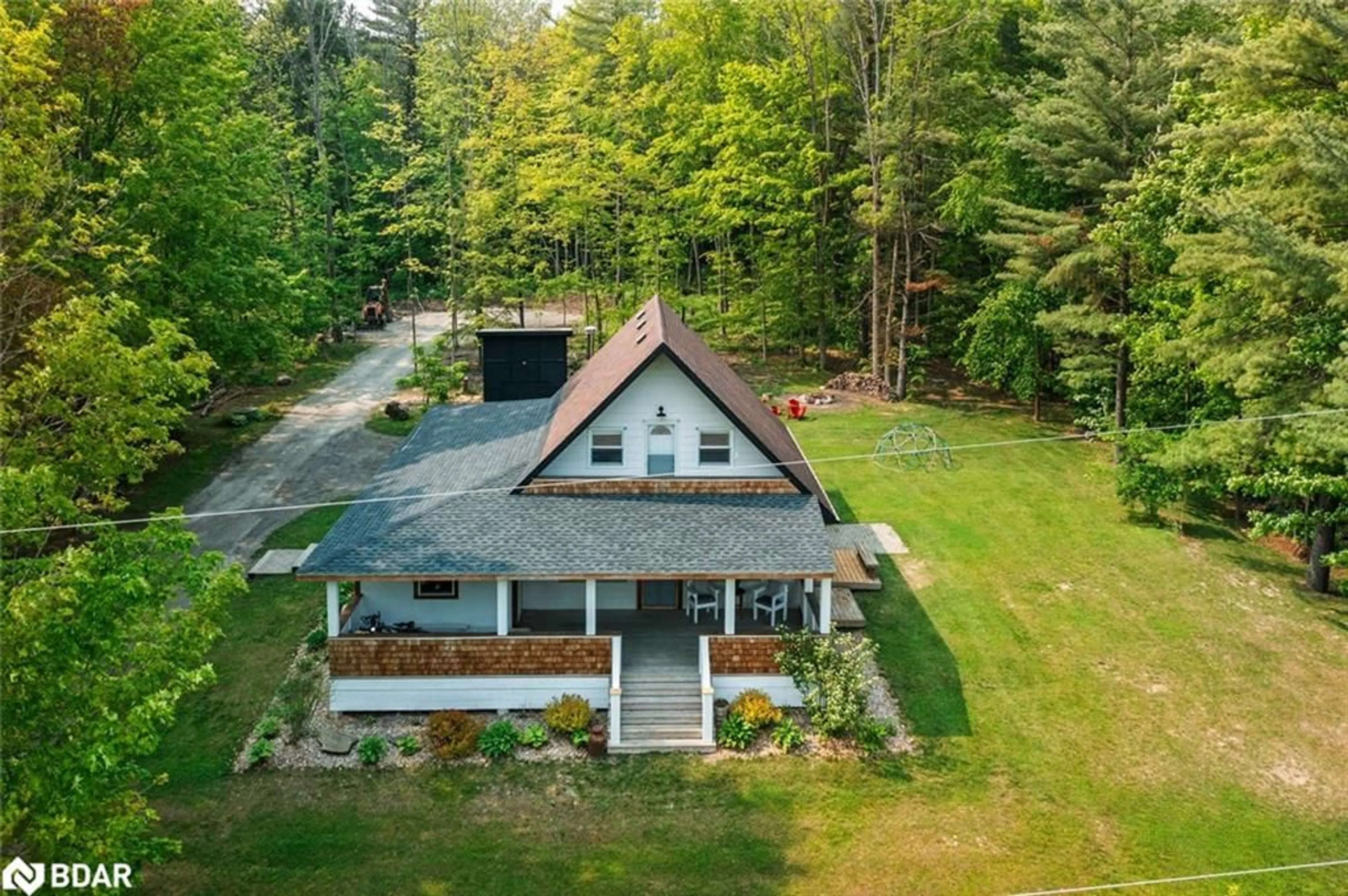 A pic from outside/outdoor area/front of a property/back of a property/a pic from drone, water/lake/river/ocean view for 2352 Mcdonald Rd, Elmvale Ontario L0L 1P0