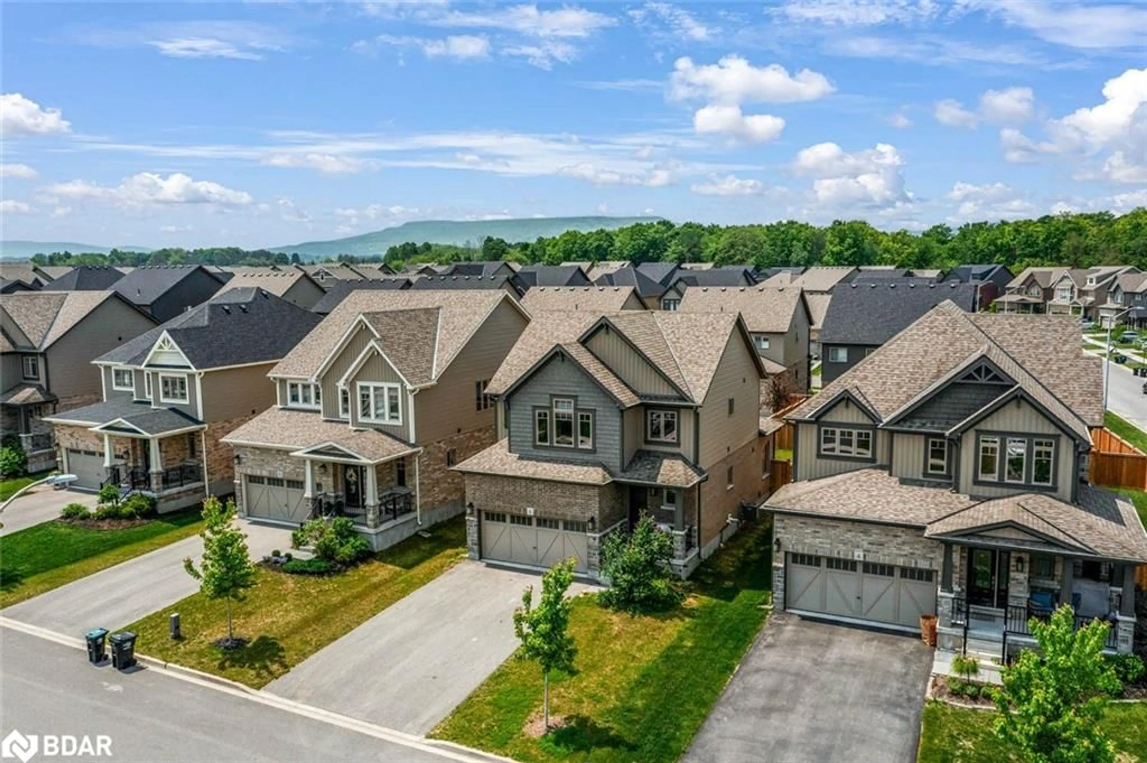 A pic from outside/outdoor area/front of a property/back of a property/a pic from drone, mountain view for 6 Bassett Street, Collingwood Ontario L9Y 3B7