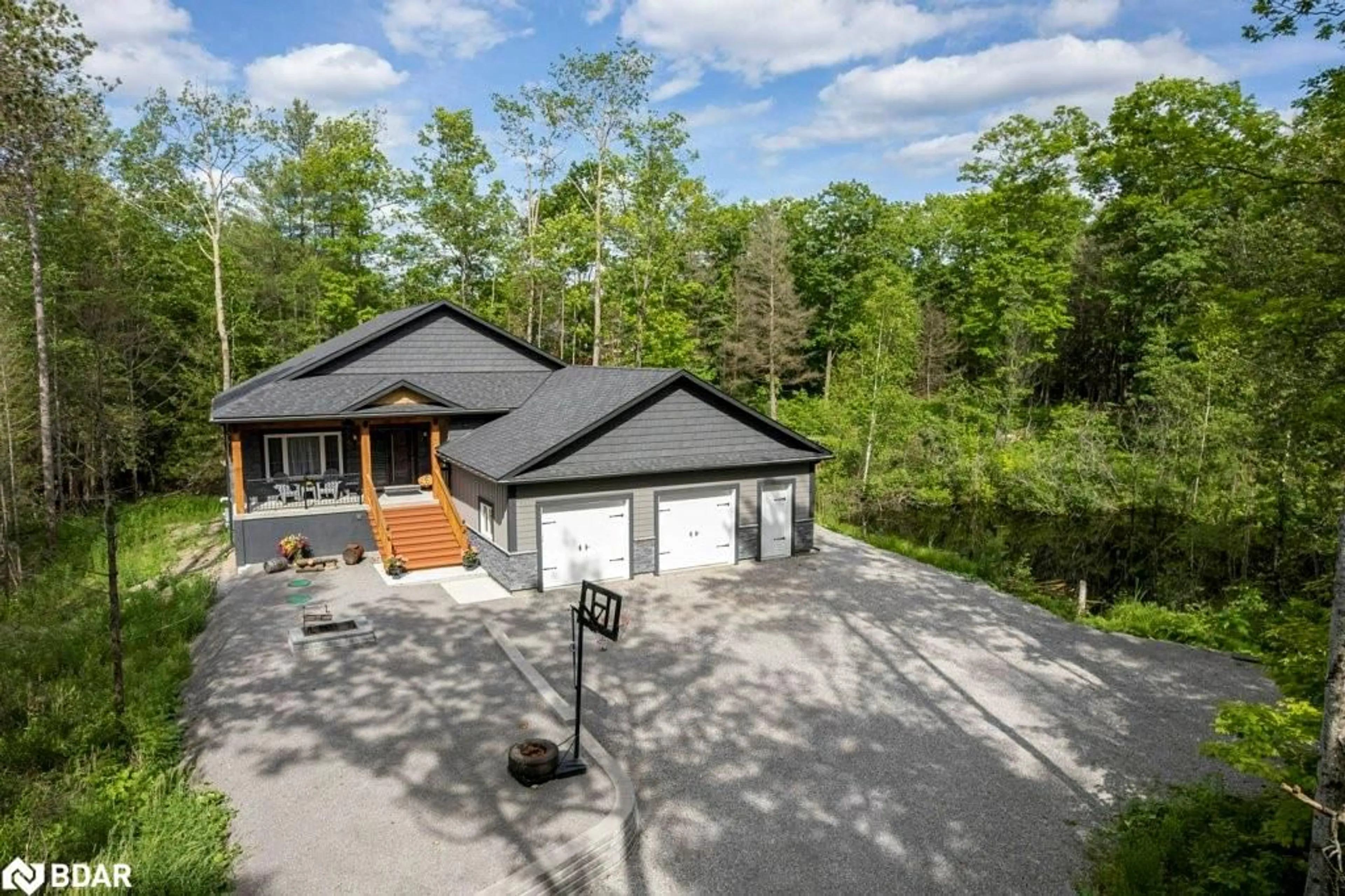 A pic from outside/outdoor area/front of a property/back of a property/a pic from drone, unknown for 4006 County Road 36 Rd, Buckhorn Ontario K0L 1J0