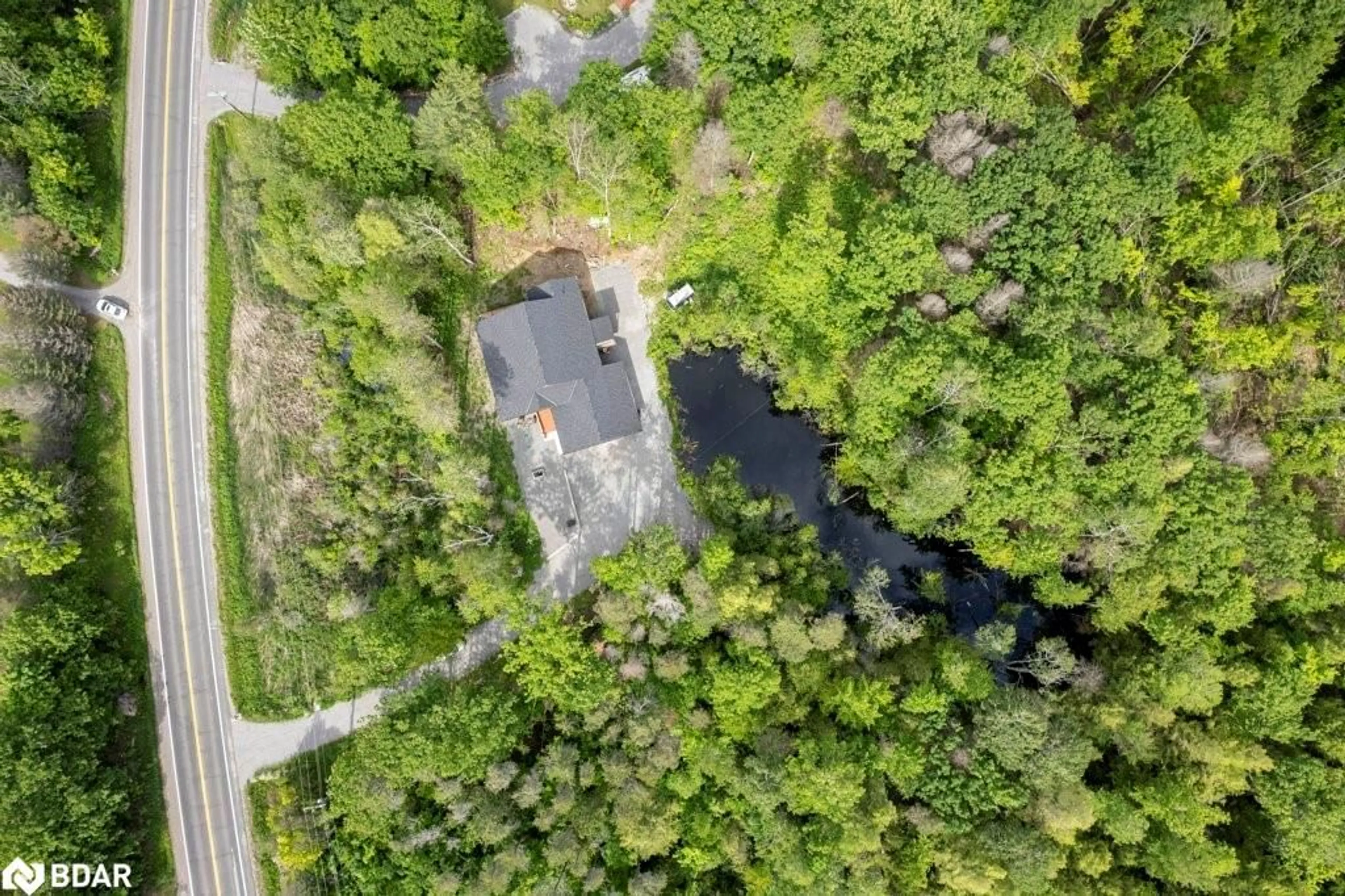 A pic from outside/outdoor area/front of a property/back of a property/a pic from drone, water/lake/river/ocean view for 4006 County Road 36 Rd, Buckhorn Ontario K0L 1J0