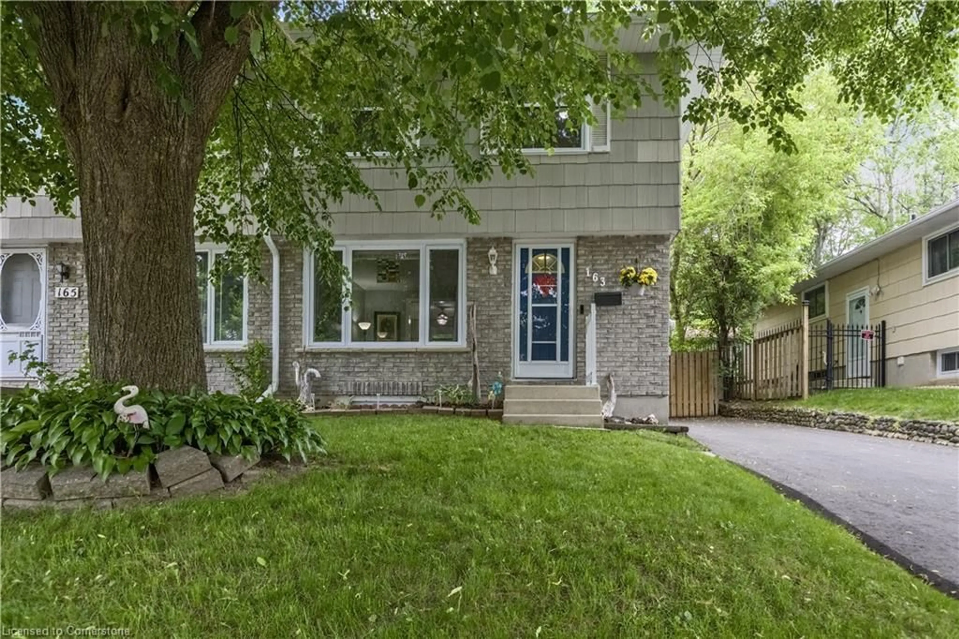 Home with brick exterior material, street for 163 Woodside Ave, Cambridge Ontario N1S 3X5