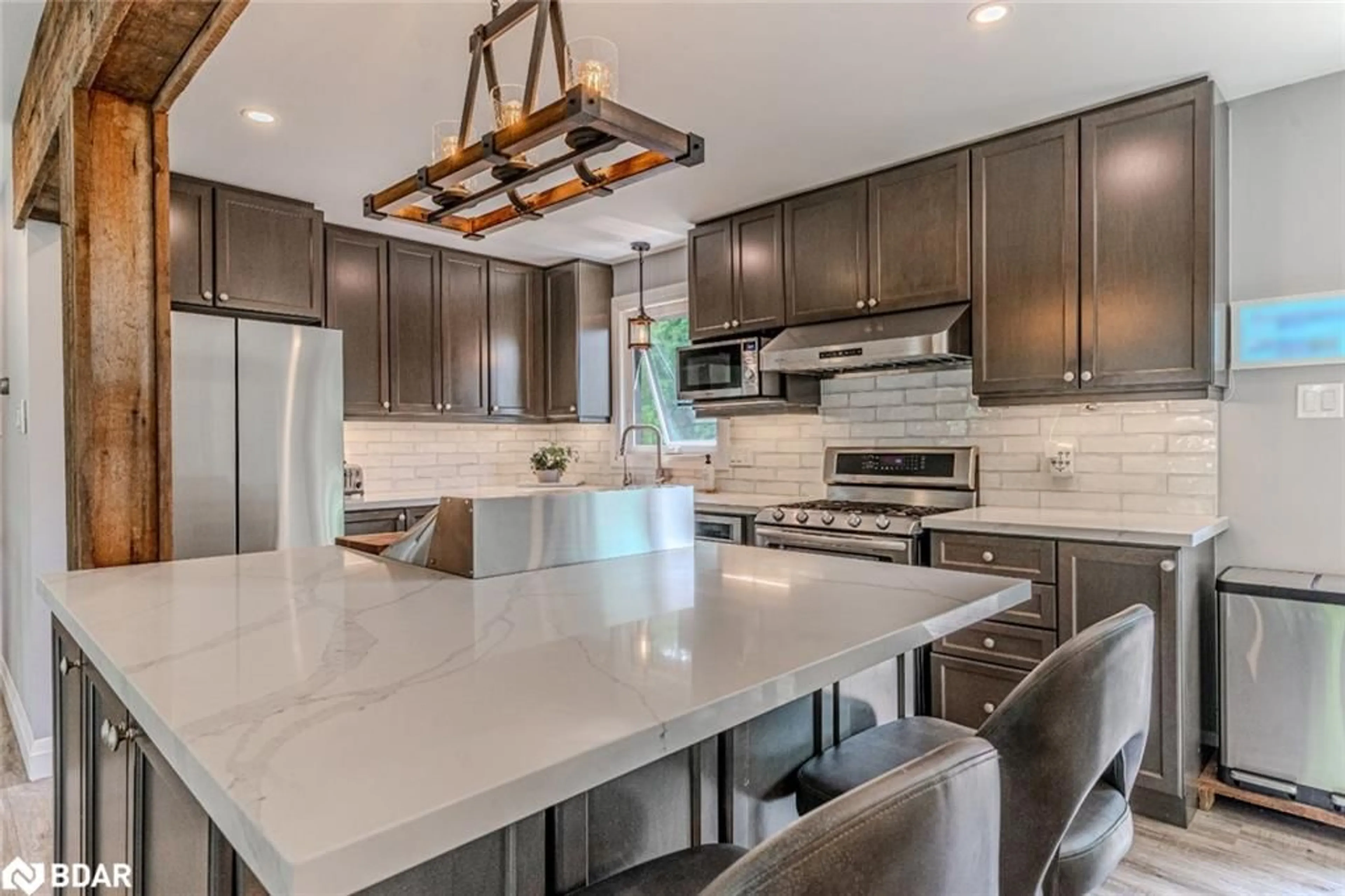 Open concept kitchen, ceramic/tile floor for 34 Foyston Park Circle, Minesing Ontario L9X 0A1