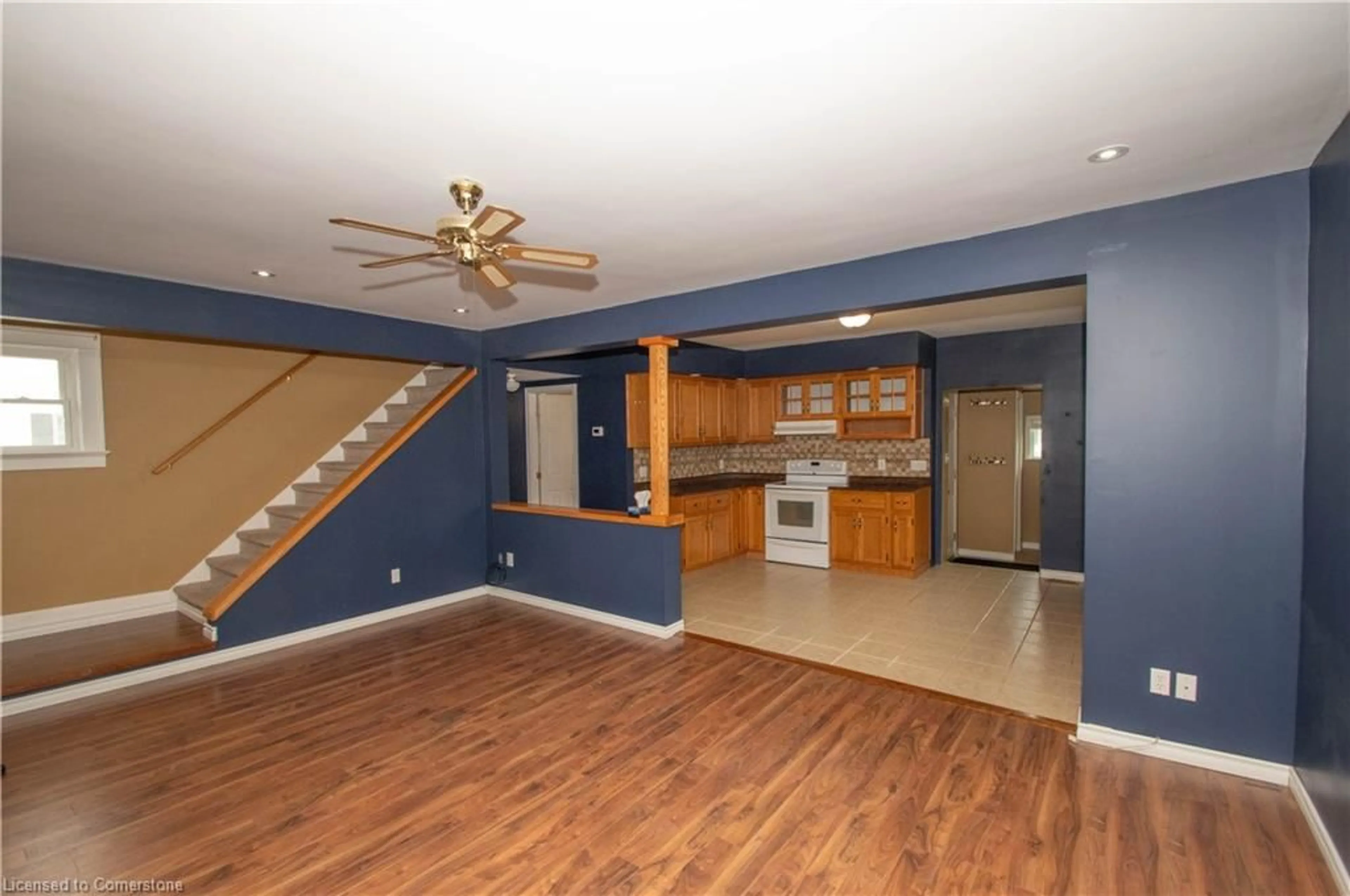 Open concept kitchen, wood/laminate floor for 177 Owen St, Simcoe Ontario N3Y 2T8