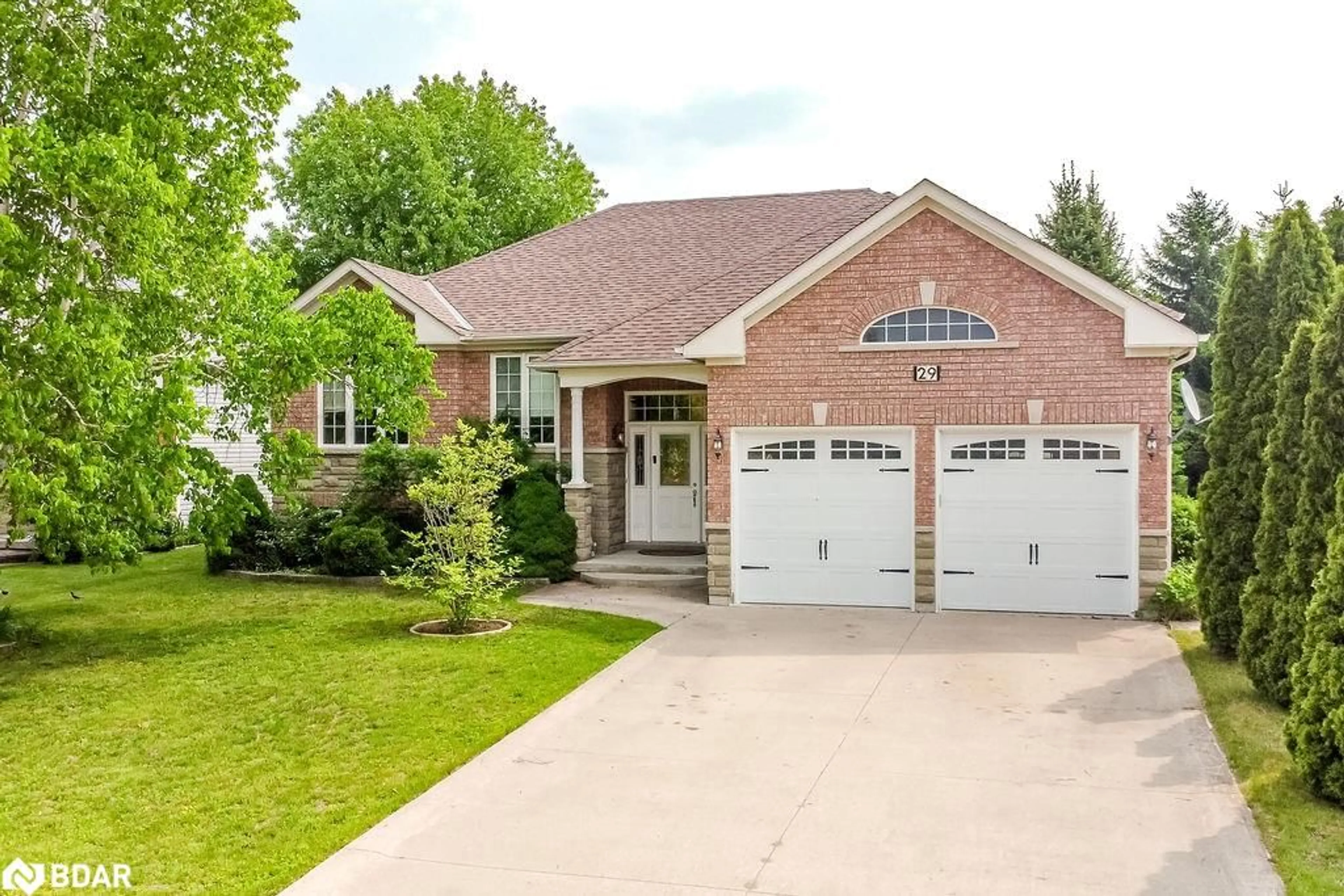 Home with brick exterior material, street for 29 Old Hickory Lane, Wasaga Beach Ontario L9Z 3B1