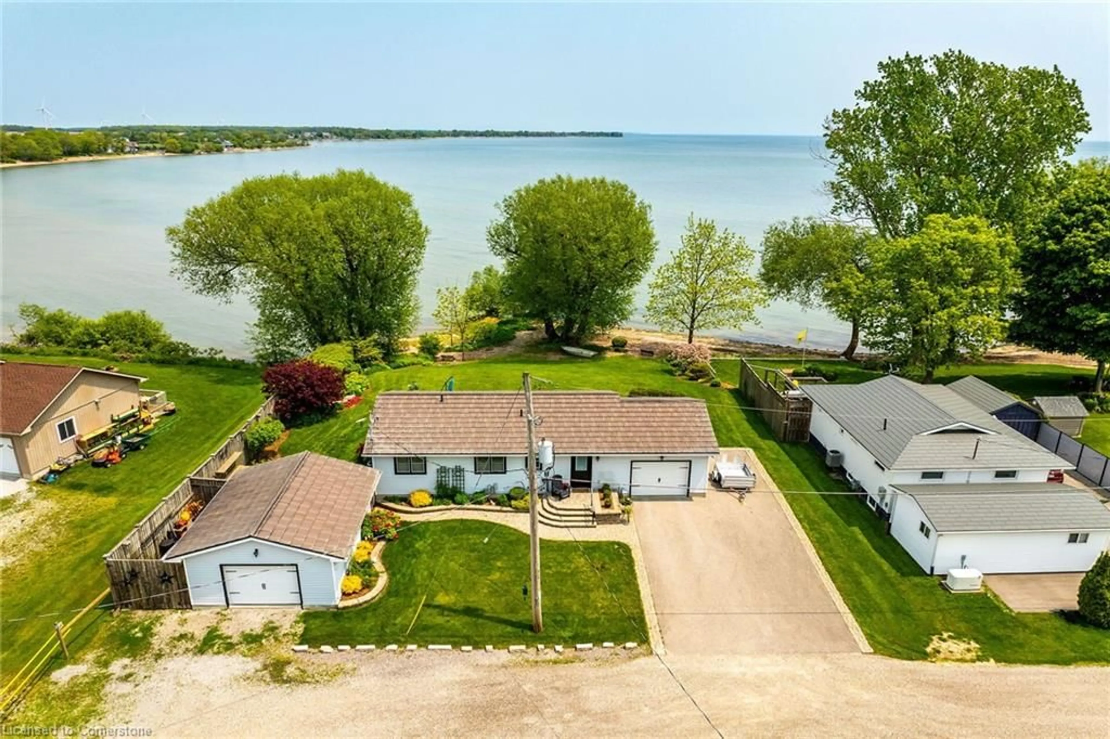 A pic from outside/outdoor area/front of a property/back of a property/a pic from drone, water/lake/river/ocean view for 92 Hoover Point Lane, Selkirk Ontario N0A 1P0