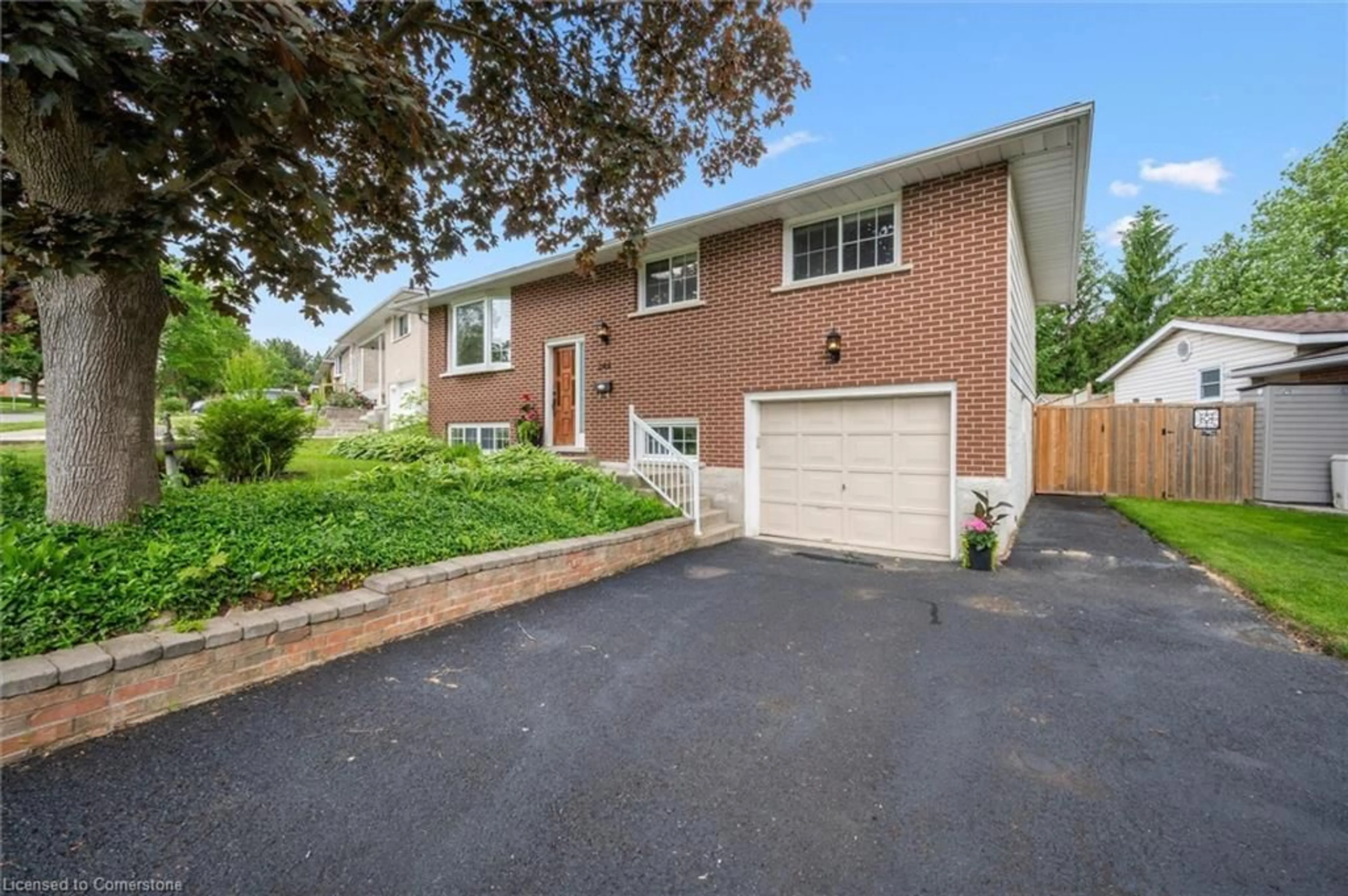 Home with brick exterior material, street for 244 Westwood Dr, Kitchener Ontario N2M 2L2
