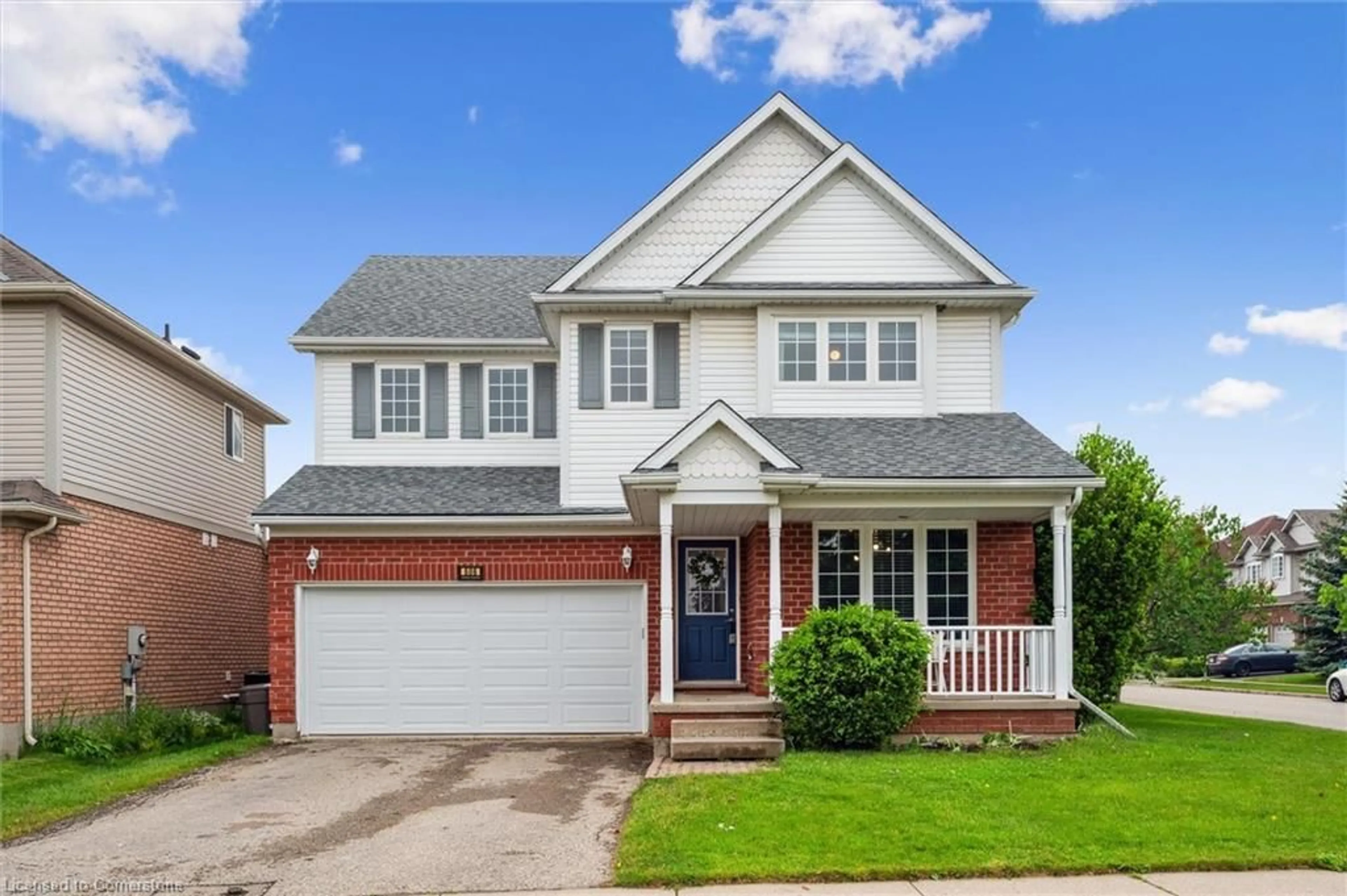 Home with brick exterior material, street for 606 Eastbridge Blvd, Waterloo Ontario N2K 4H4