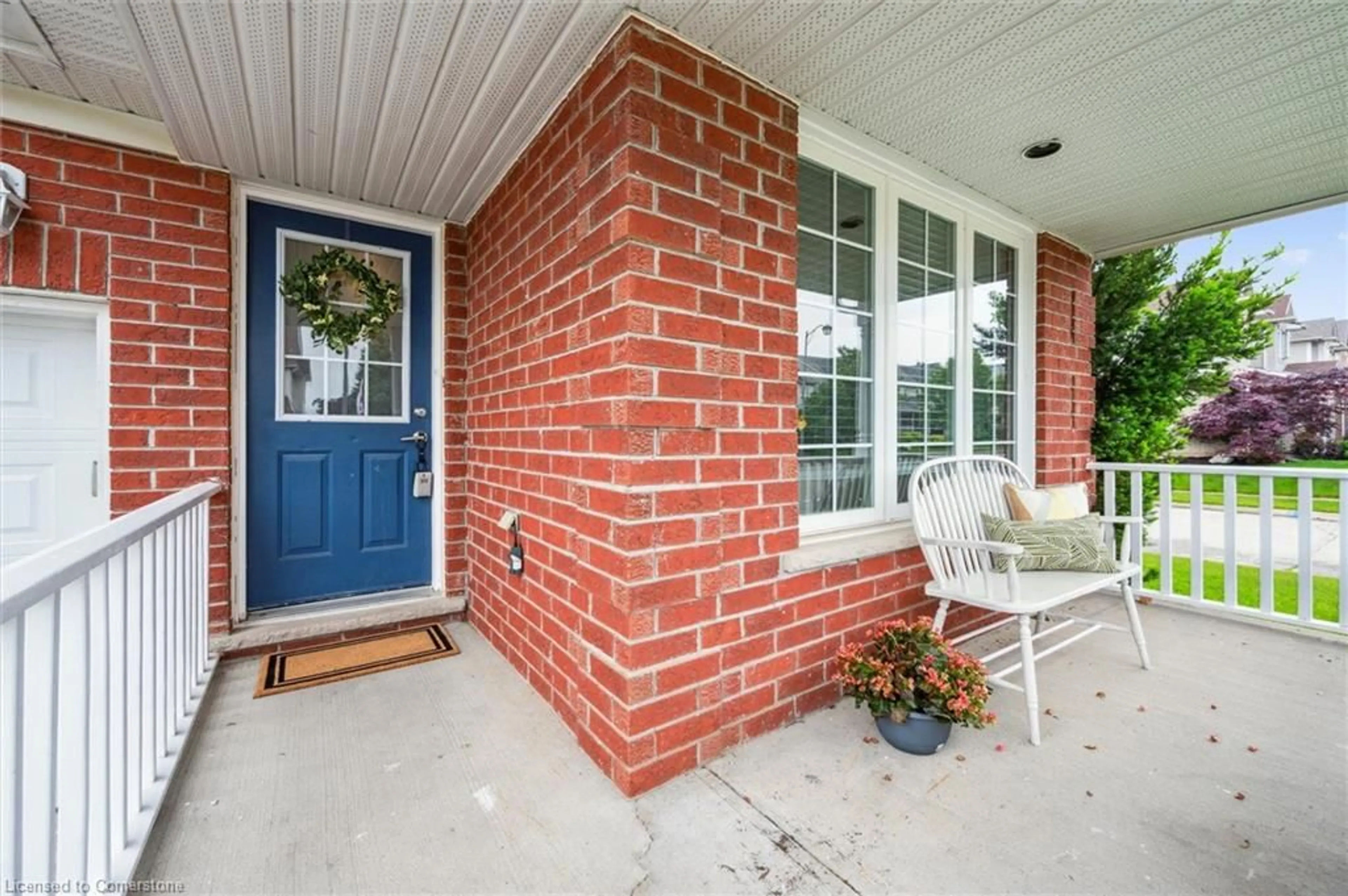 Home with brick exterior material, street for 606 Eastbridge Blvd, Waterloo Ontario N2K 4H4