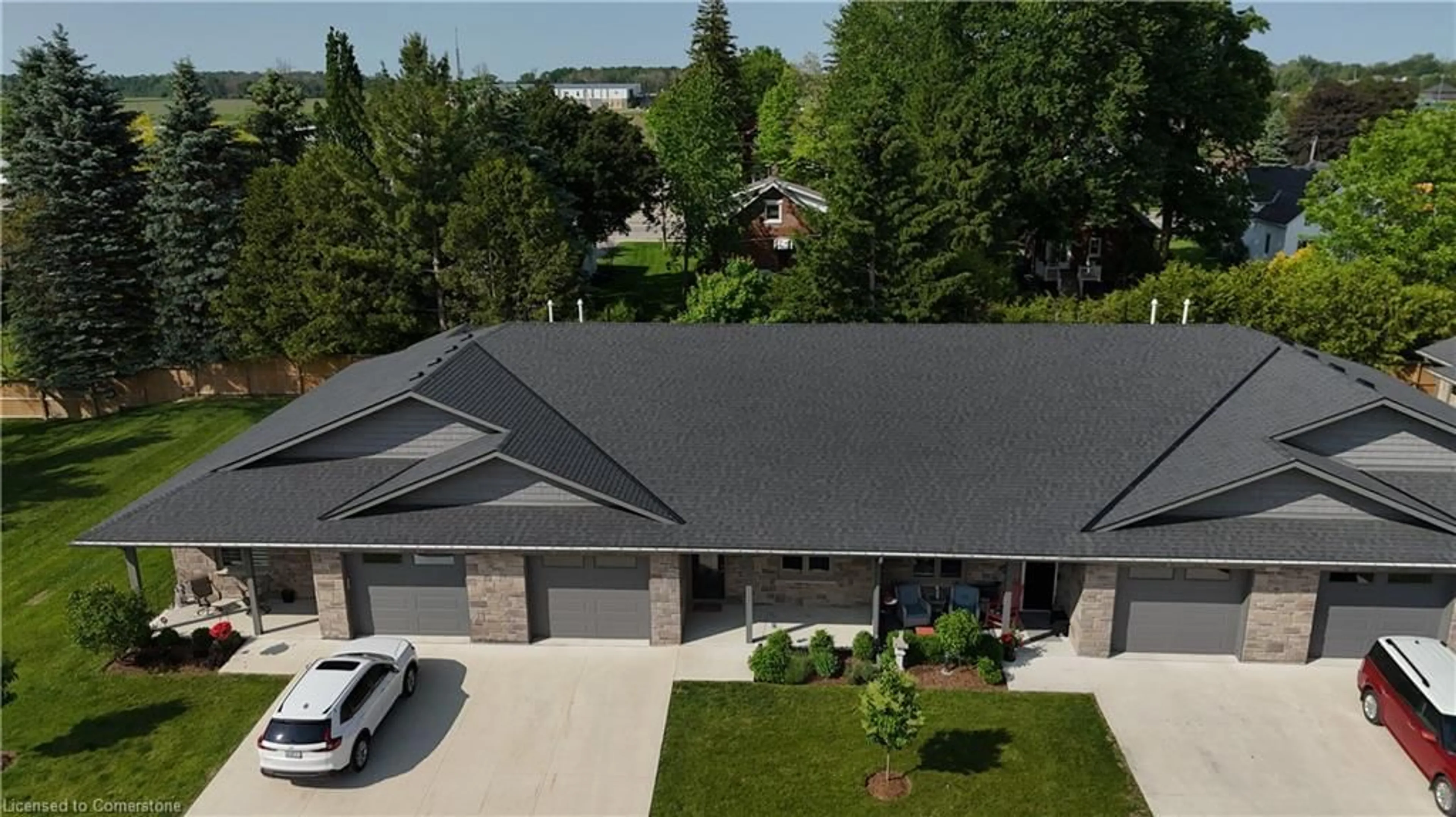 A pic from outside/outdoor area/front of a property/back of a property/a pic from drone, street for 375 Mitchell Rd #71, Listowel Ontario N4W 0H4