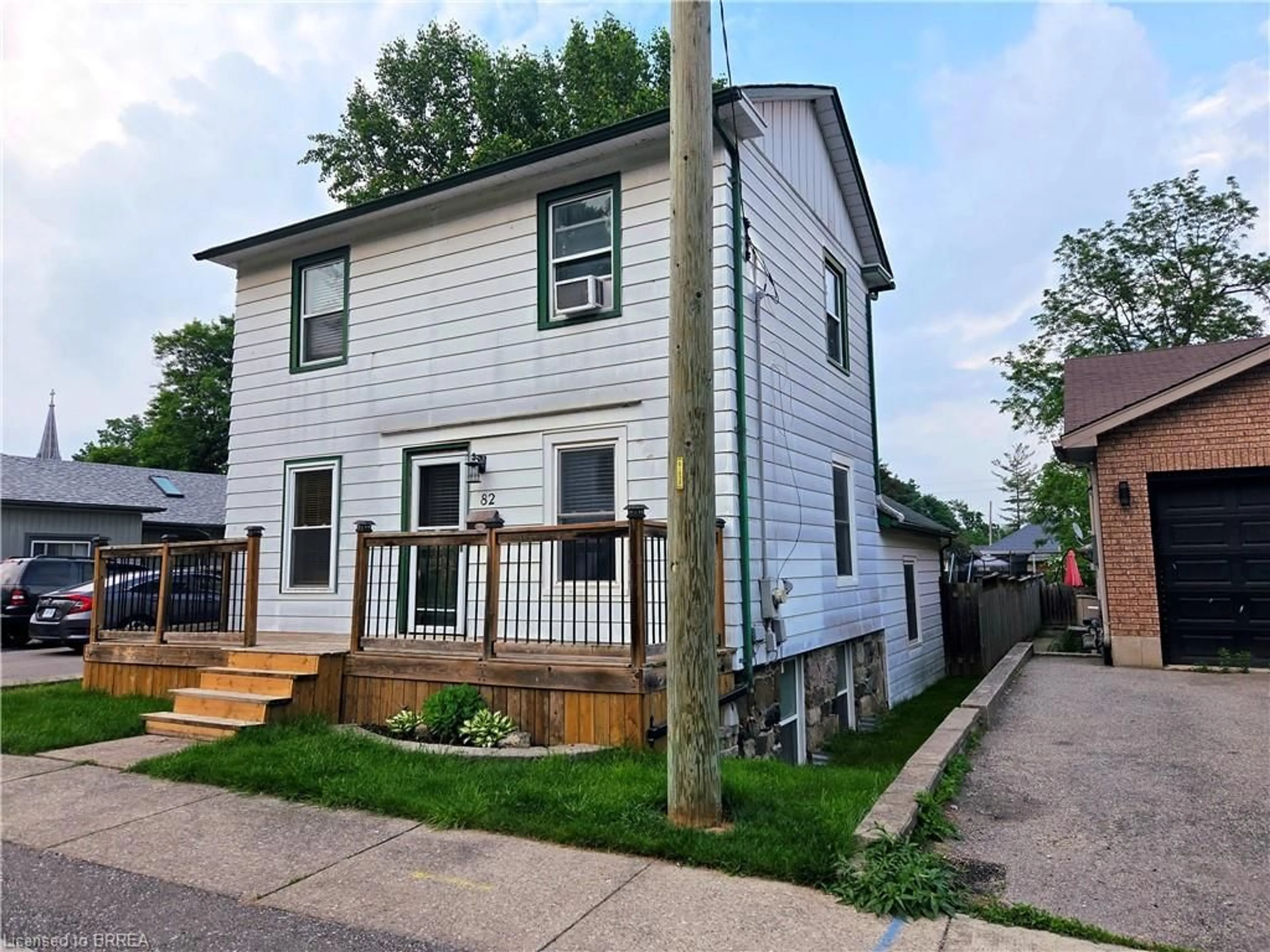 Home with vinyl exterior material, street for 82 Dumfries St, Paris Ontario N3L 2E6