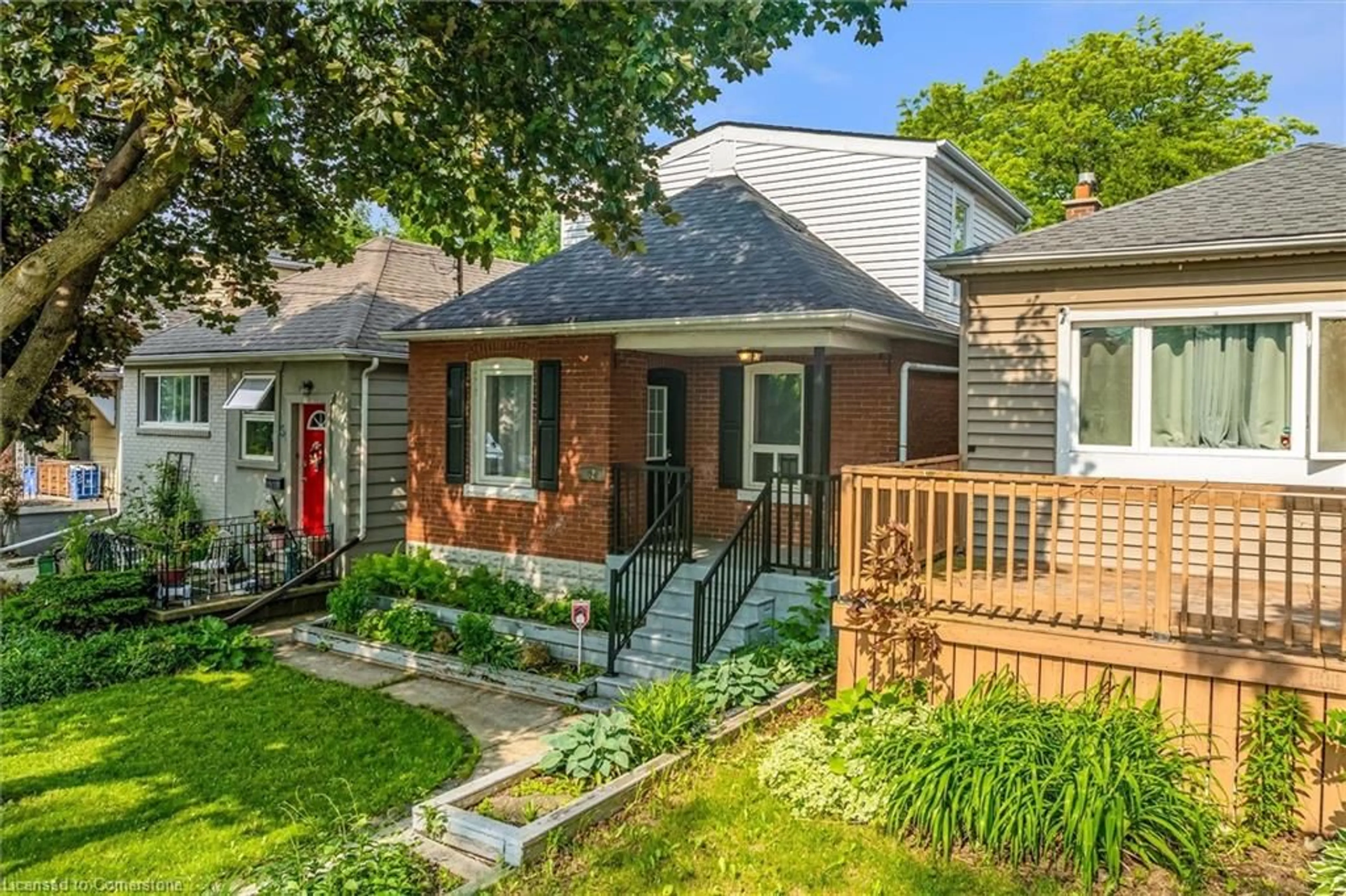 Home with brick exterior material, street for 52 East 24th St, Hamilton Ontario L8V 2X7