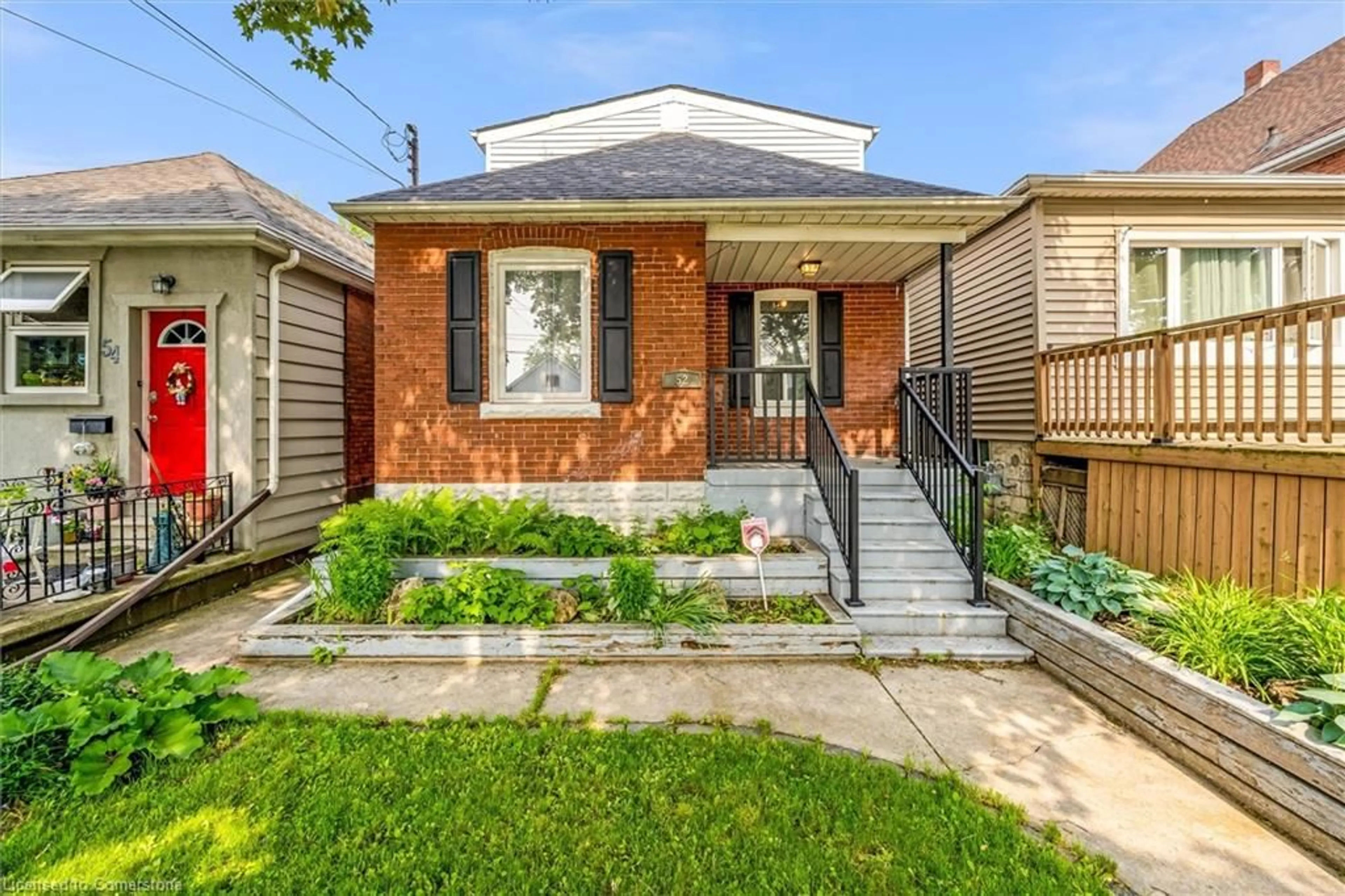 Home with brick exterior material, street for 52 East 24th St, Hamilton Ontario L8V 2X7