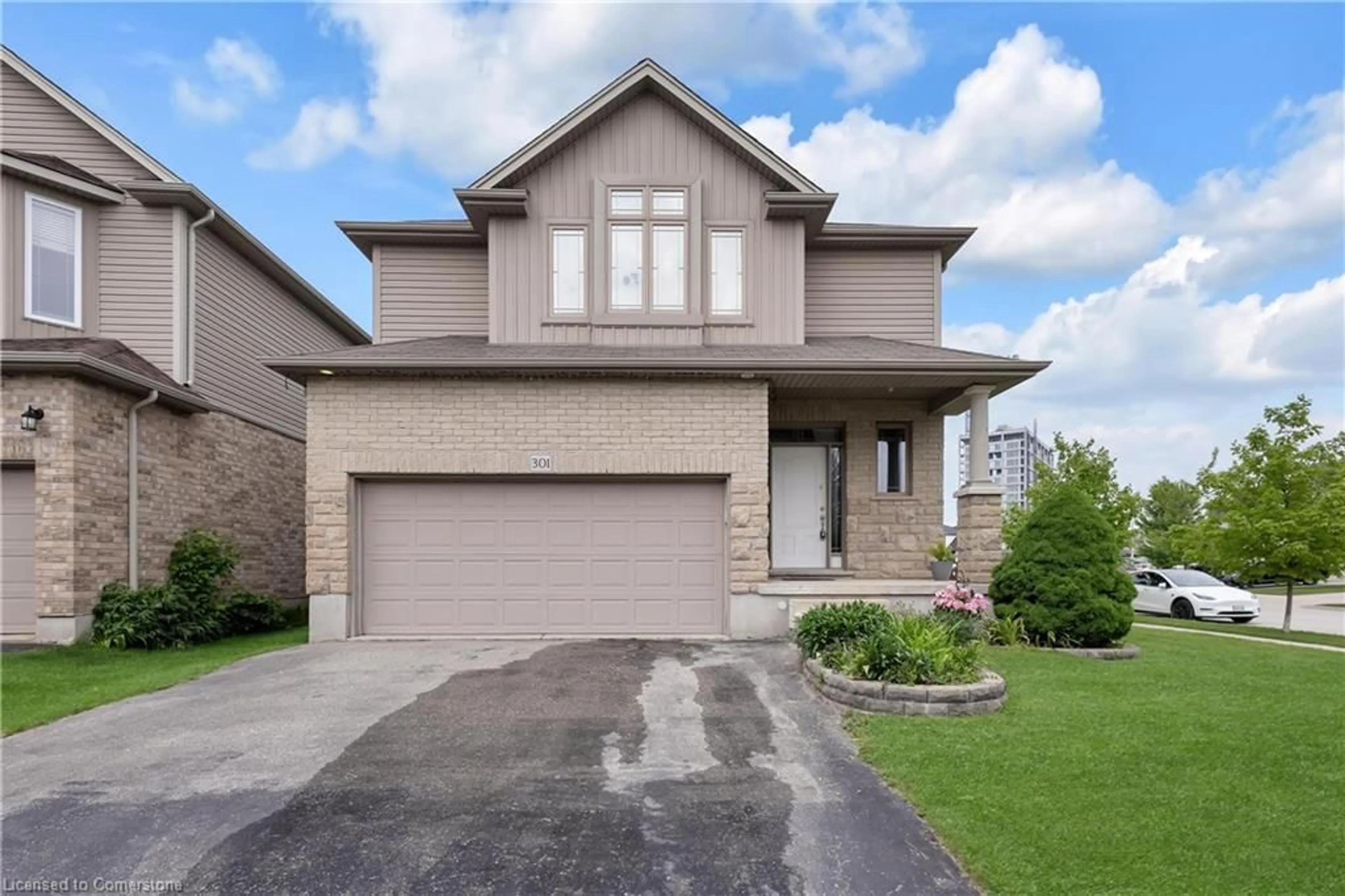 Home with brick exterior material, street for 301 Westpark Cres, Waterloo Ontario N2T 0A4