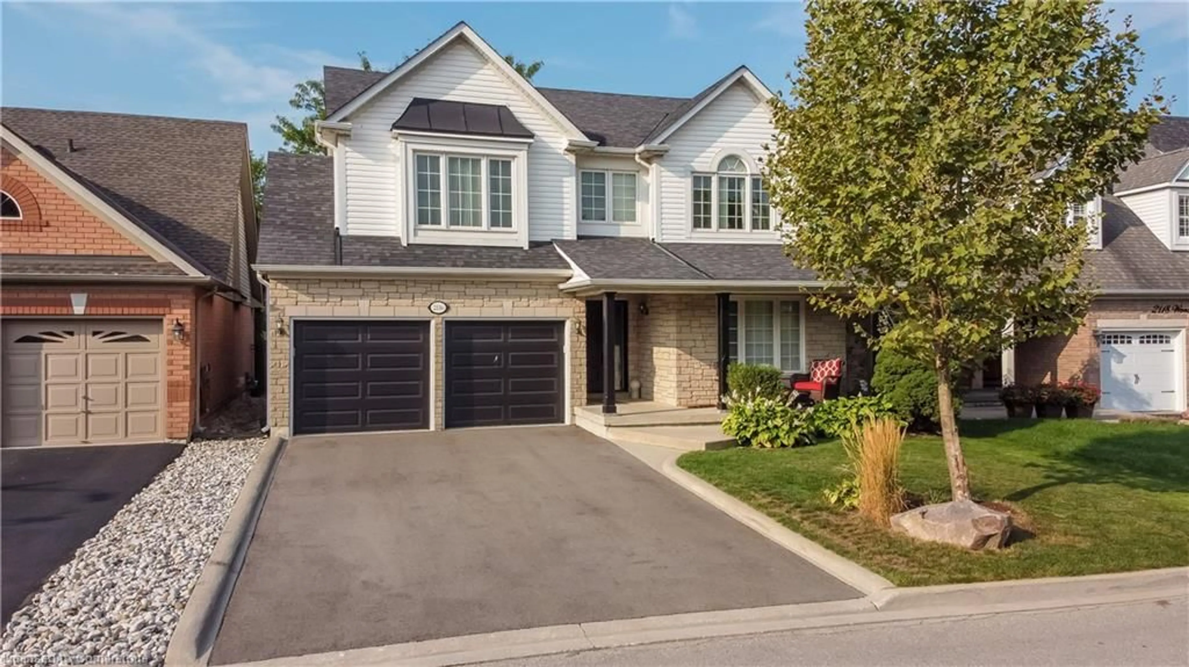 Home with brick exterior material, street for 2116 Woodsmere Crt, Burlington Ontario L7L 6J5