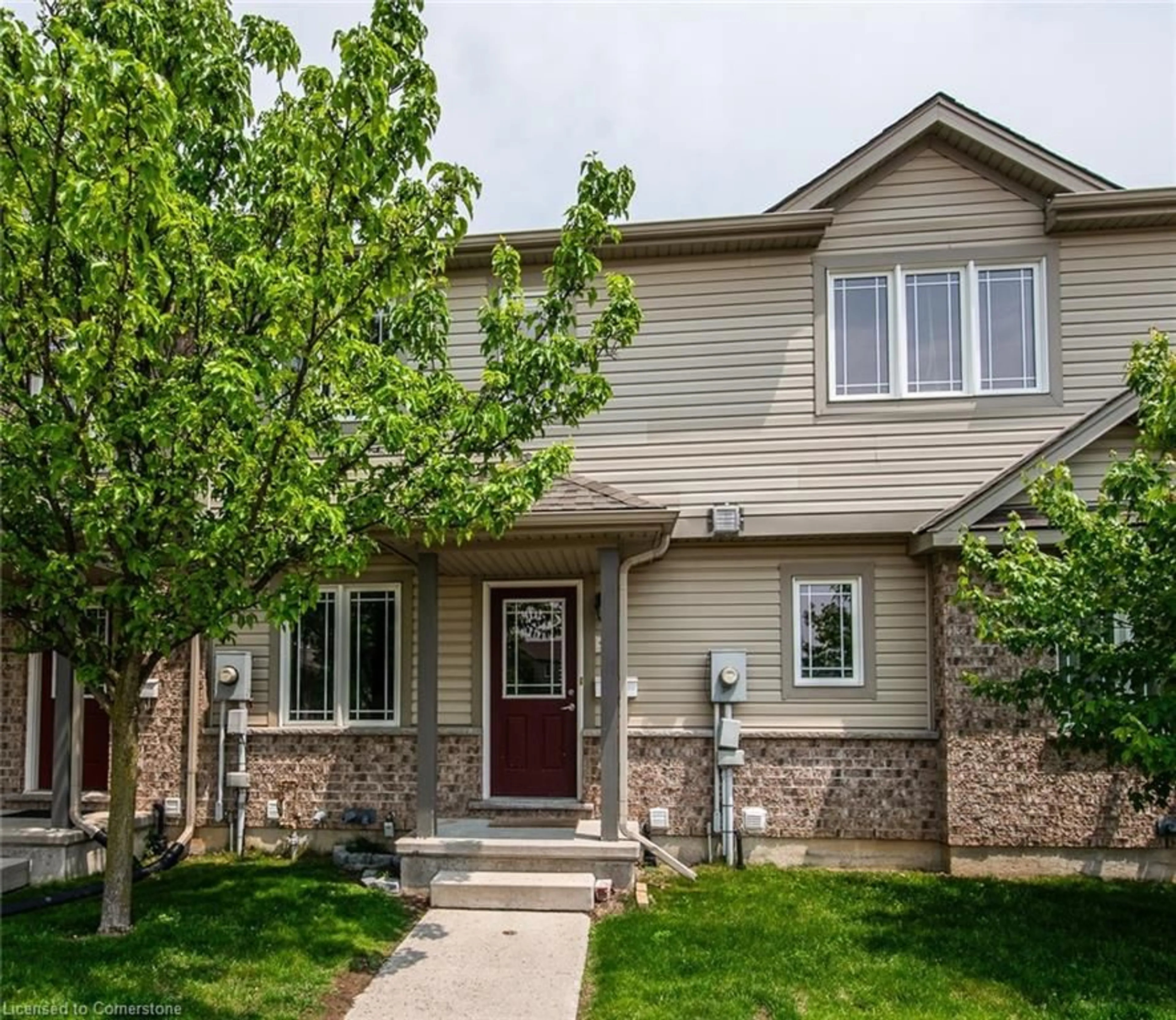 Home with vinyl exterior material, street for 535 Windflower Cres #51, Kitchener Ontario N2E 4L7