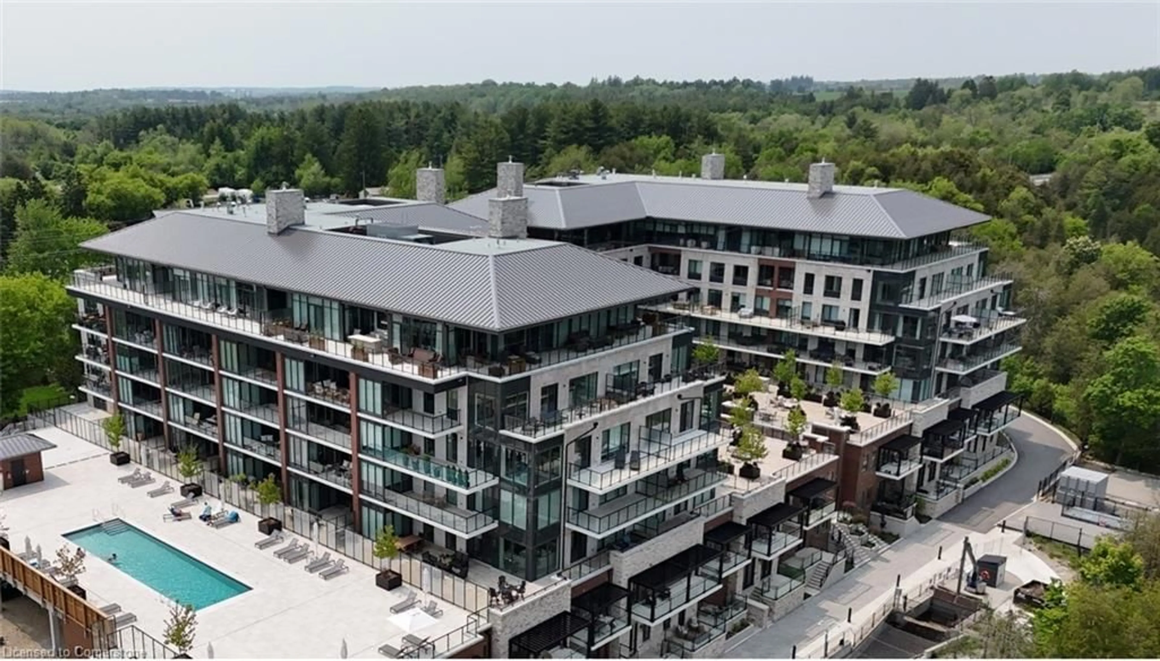 A pic from outside/outdoor area/front of a property/back of a property/a pic from drone, building for 6523 Wellington Road 7 #425, Elora Ontario N0B 1S0