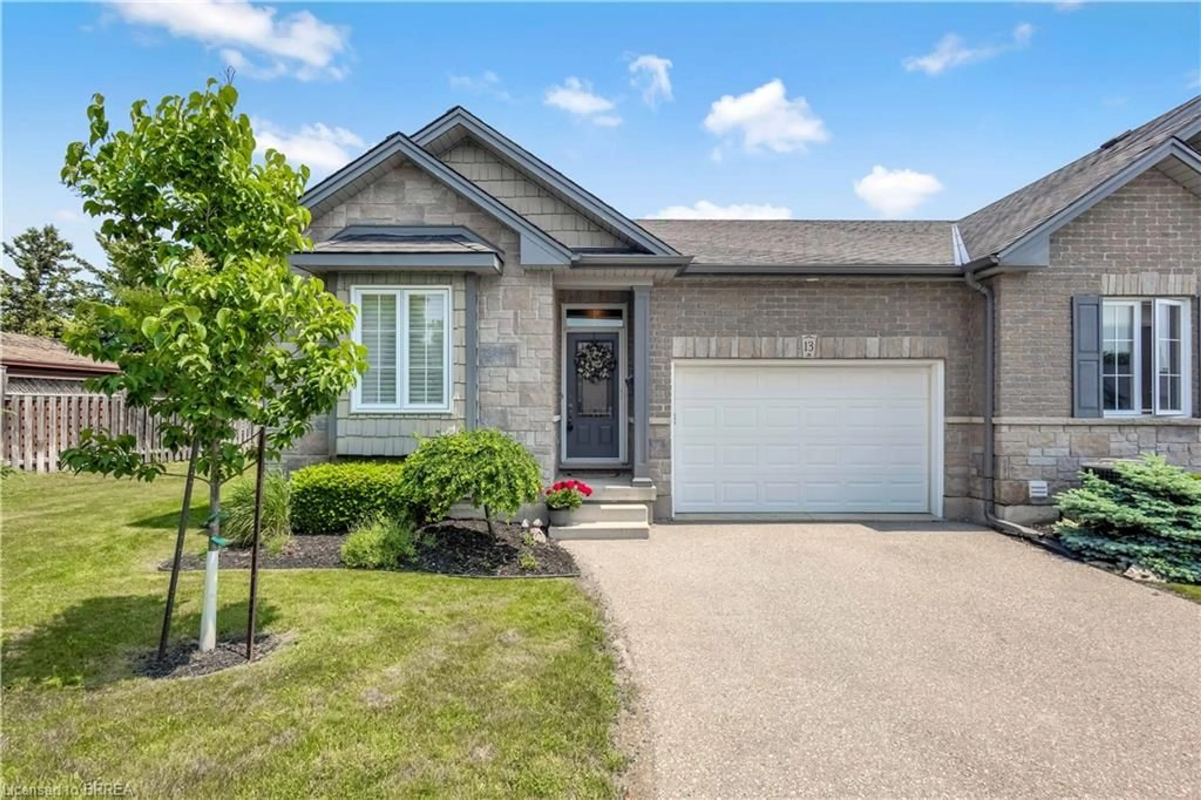 Home with brick exterior material, street for 244 Dundas St #13, Paris Ontario N3L 0B4