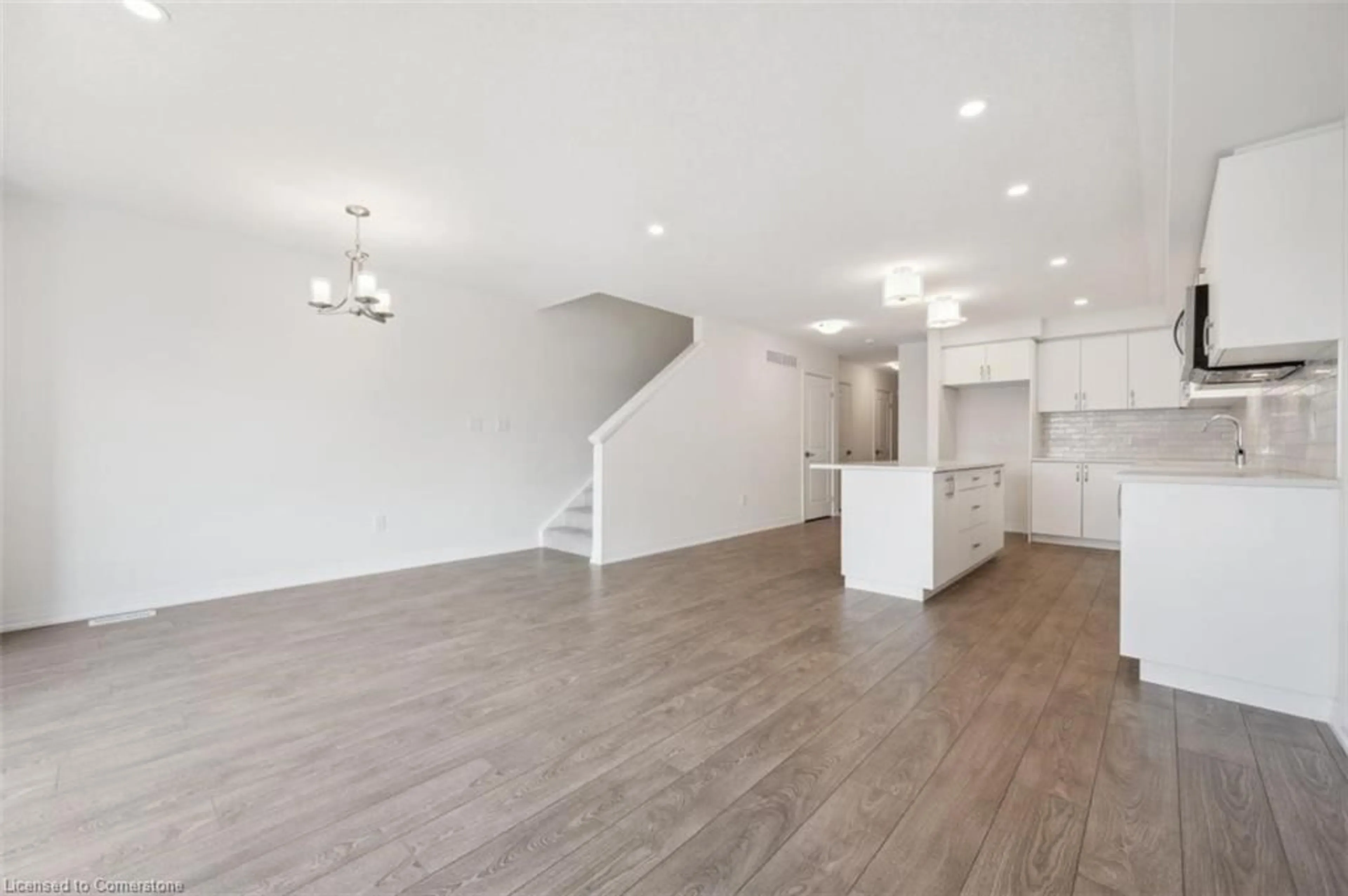 Open concept kitchen, wood/laminate floor for 29 Benninger Dr, Kitchener Ontario N2E 0K4