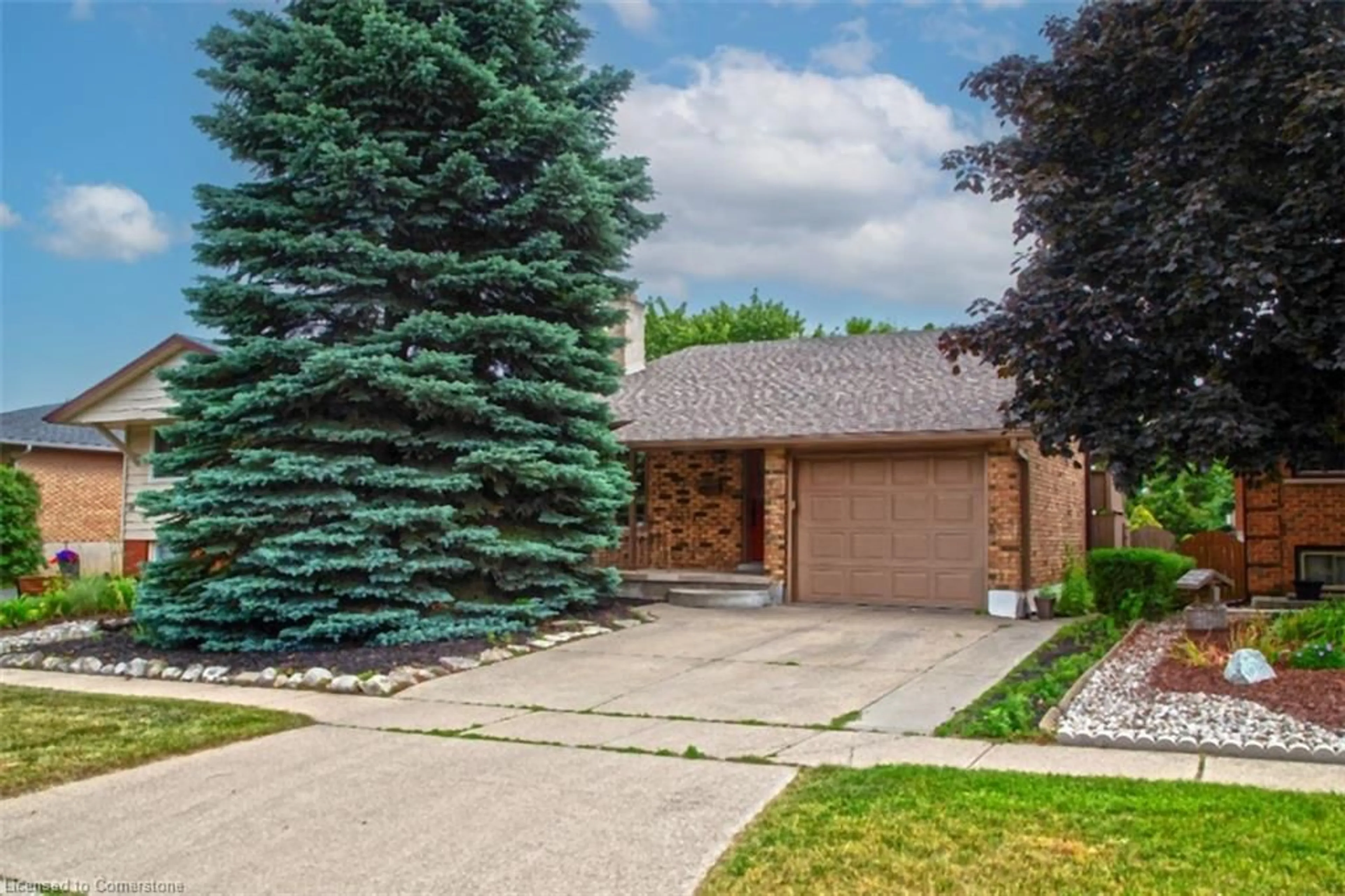 Home with brick exterior material, street for 63 Saxony Cir, Cambridge Ontario N1S 4G6