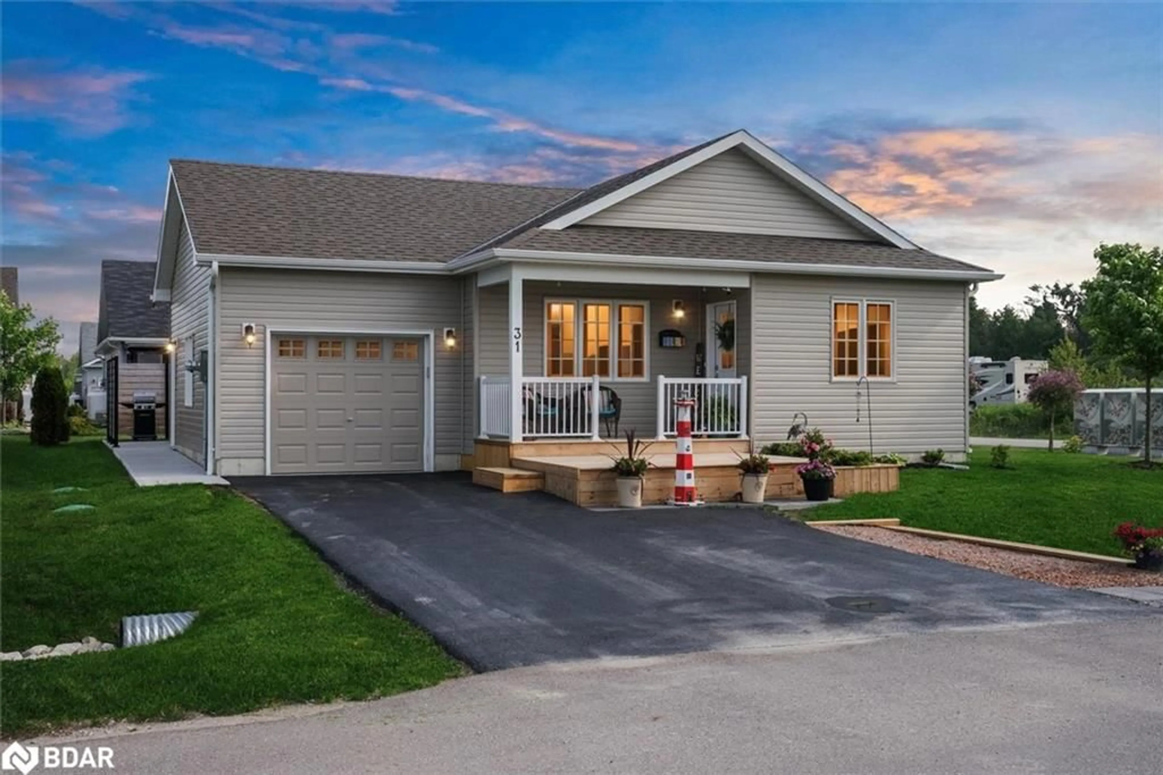 Home with vinyl exterior material, street for 31 Reynolds Dr, Ramara Ontario L3V 8K1