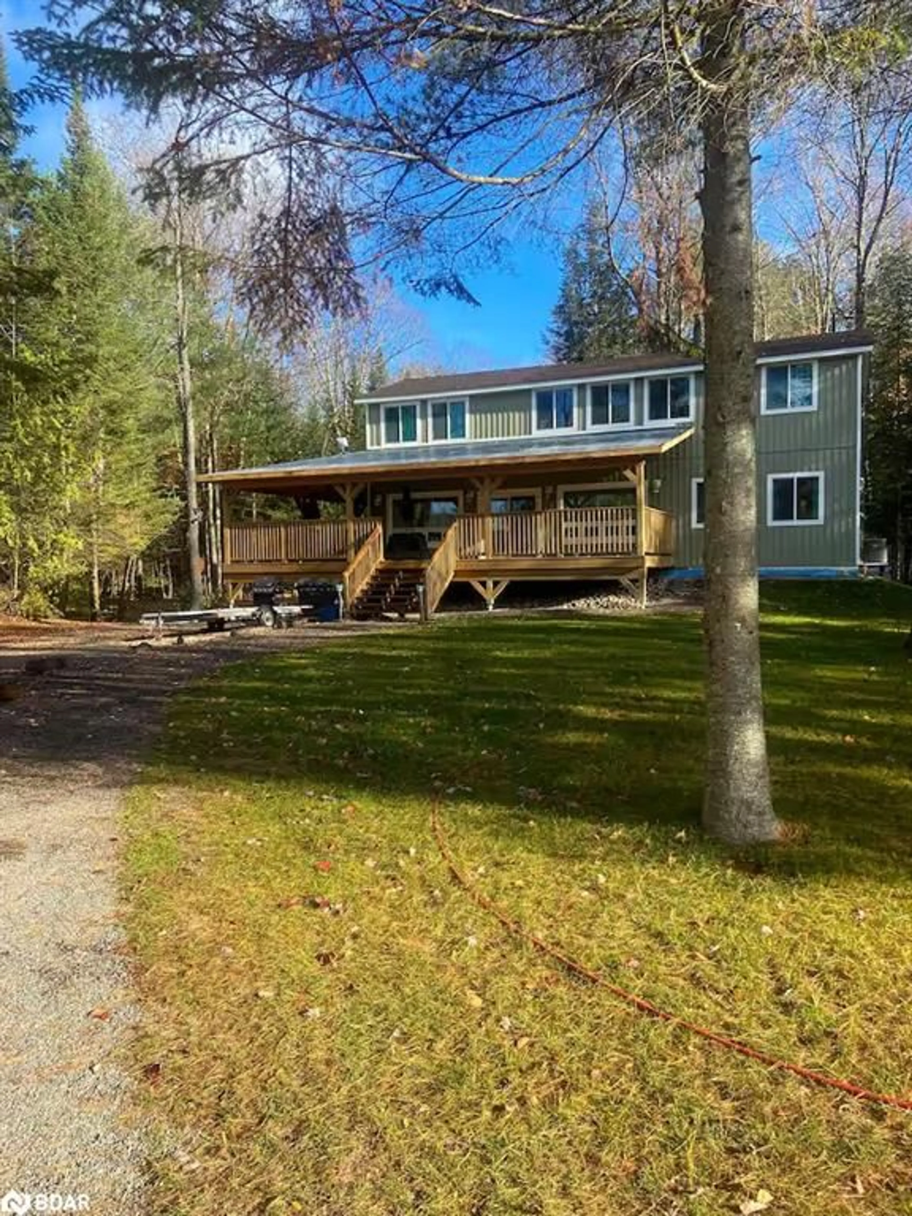 A pic from outside/outdoor area/front of a property/back of a property/a pic from drone, water/lake/river/ocean view for 1013 Goodlife Lane Lane, Dorset Ontario P0A 1E0
