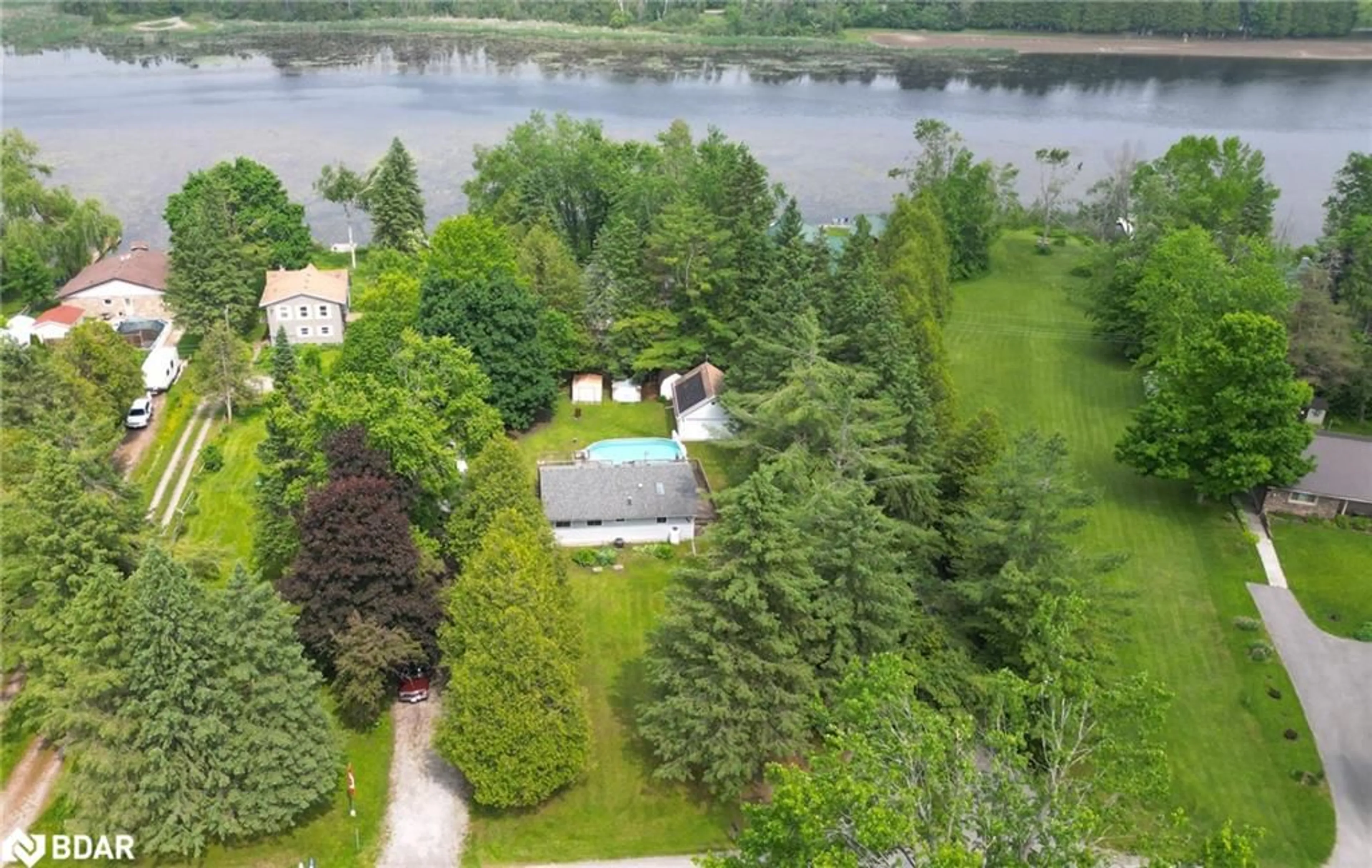 A pic from outside/outdoor area/front of a property/back of a property/a pic from drone, water/lake/river/ocean view for 66 Cowans Cres, Omemee Ontario K0L 2W0