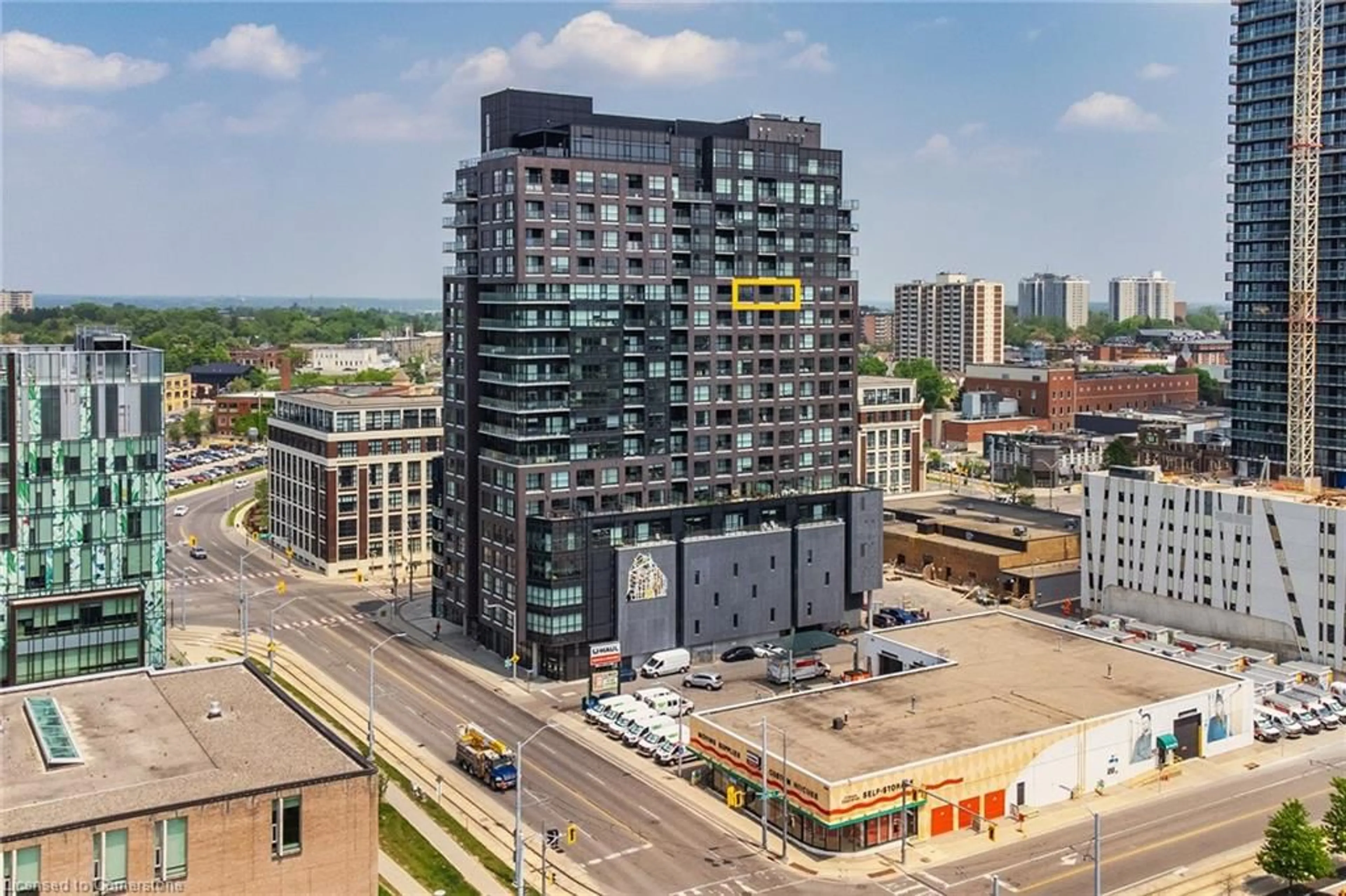 A pic from outside/outdoor area/front of a property/back of a property/a pic from drone, city buildings view from balcony for 1 Victoria St #1409, Kitchener Ontario N2G 0B5