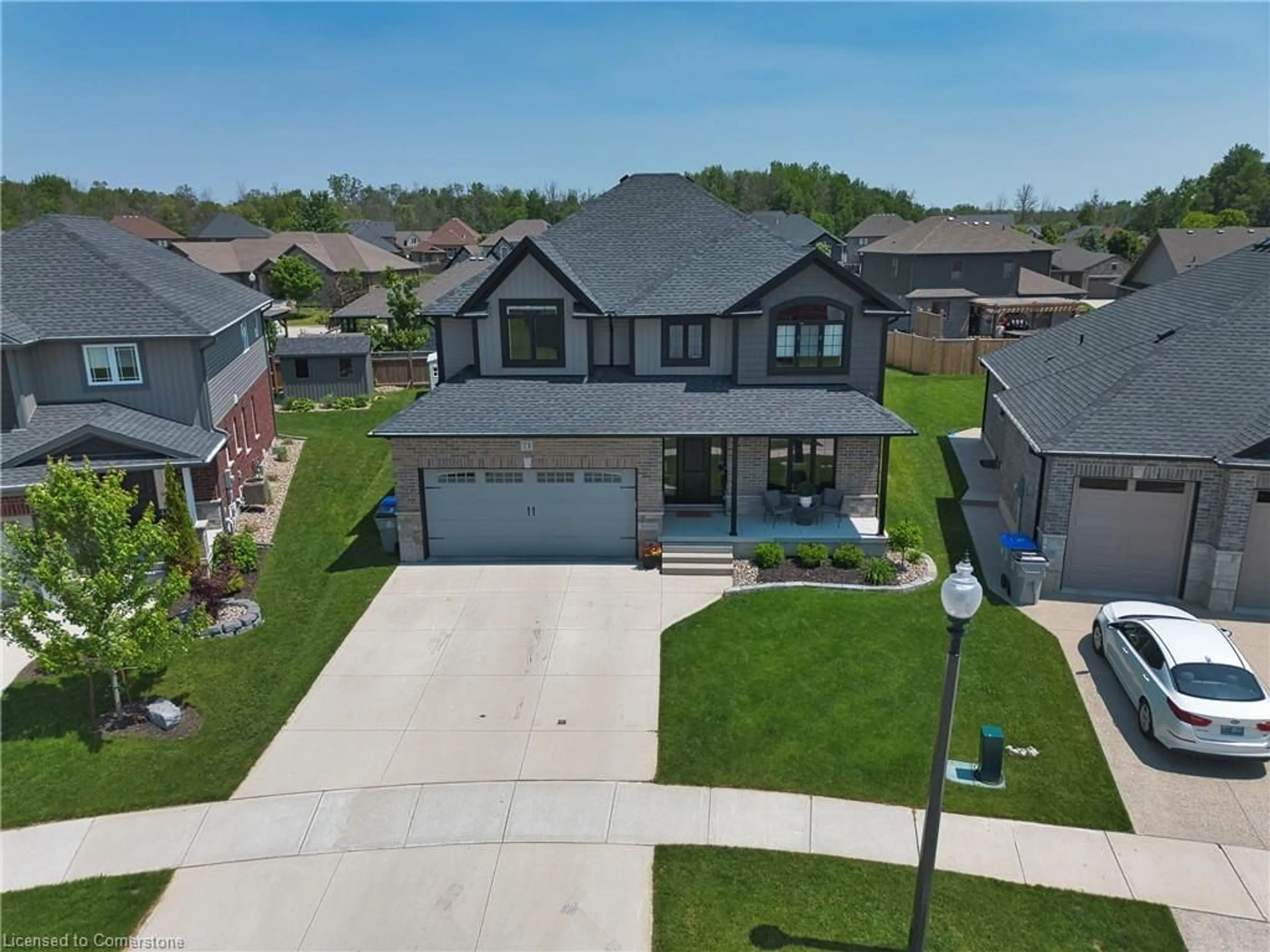 A pic from outside/outdoor area/front of a property/back of a property/a pic from drone, street for 71 Forbes Cres, Listowel Ontario N4W 0B8