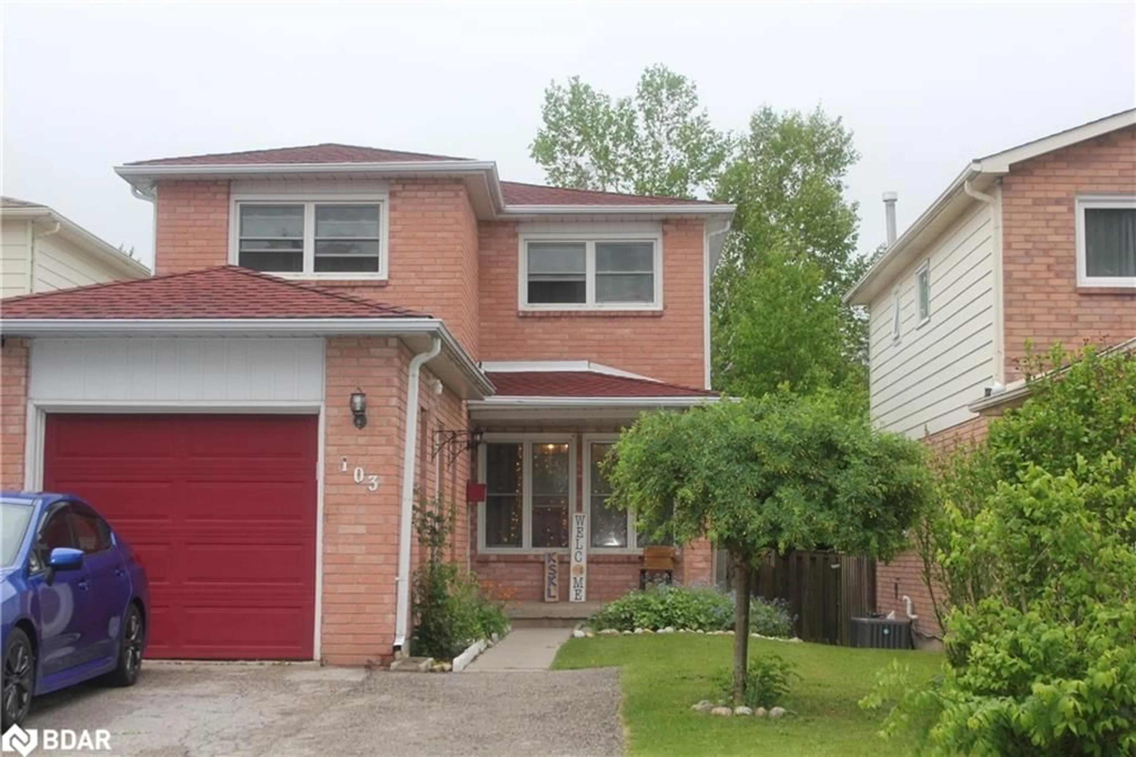 Home with brick exterior material, street for 103 Garden Dr, Barrie Ontario L4N 5T9