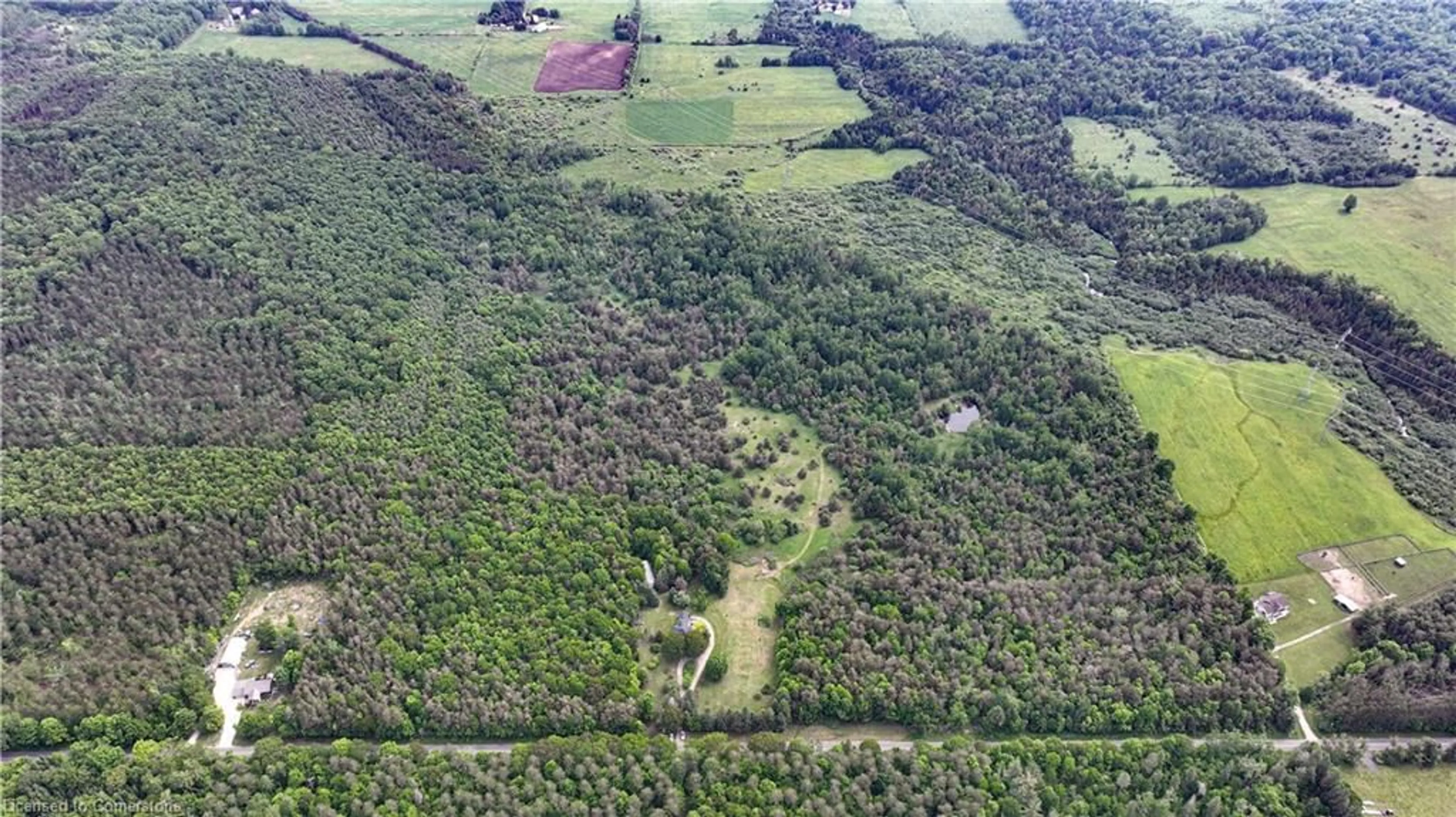 A pic from outside/outdoor area/front of a property/back of a property/a pic from drone, forest/trees view for 5789 4th Line, Hillsdale Ontario L0L 1V0