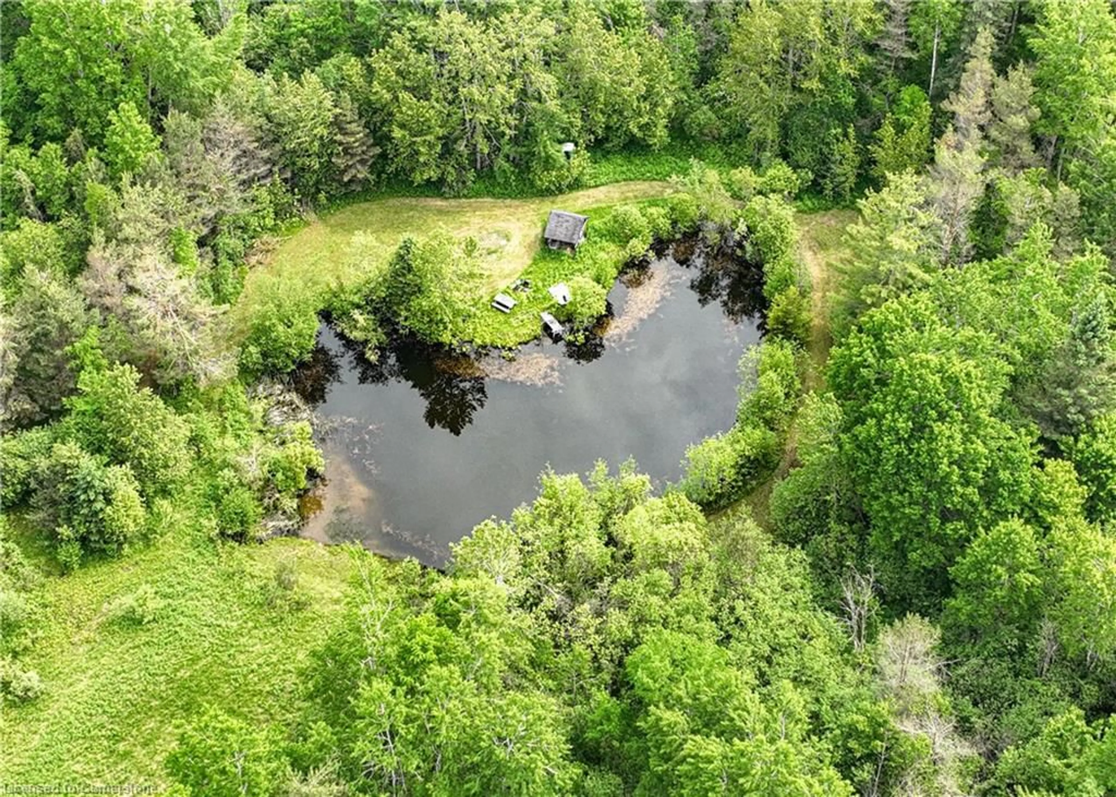 A pic from outside/outdoor area/front of a property/back of a property/a pic from drone, water/lake/river/ocean view for 5789 4th Line, Hillsdale Ontario L0L 1V0