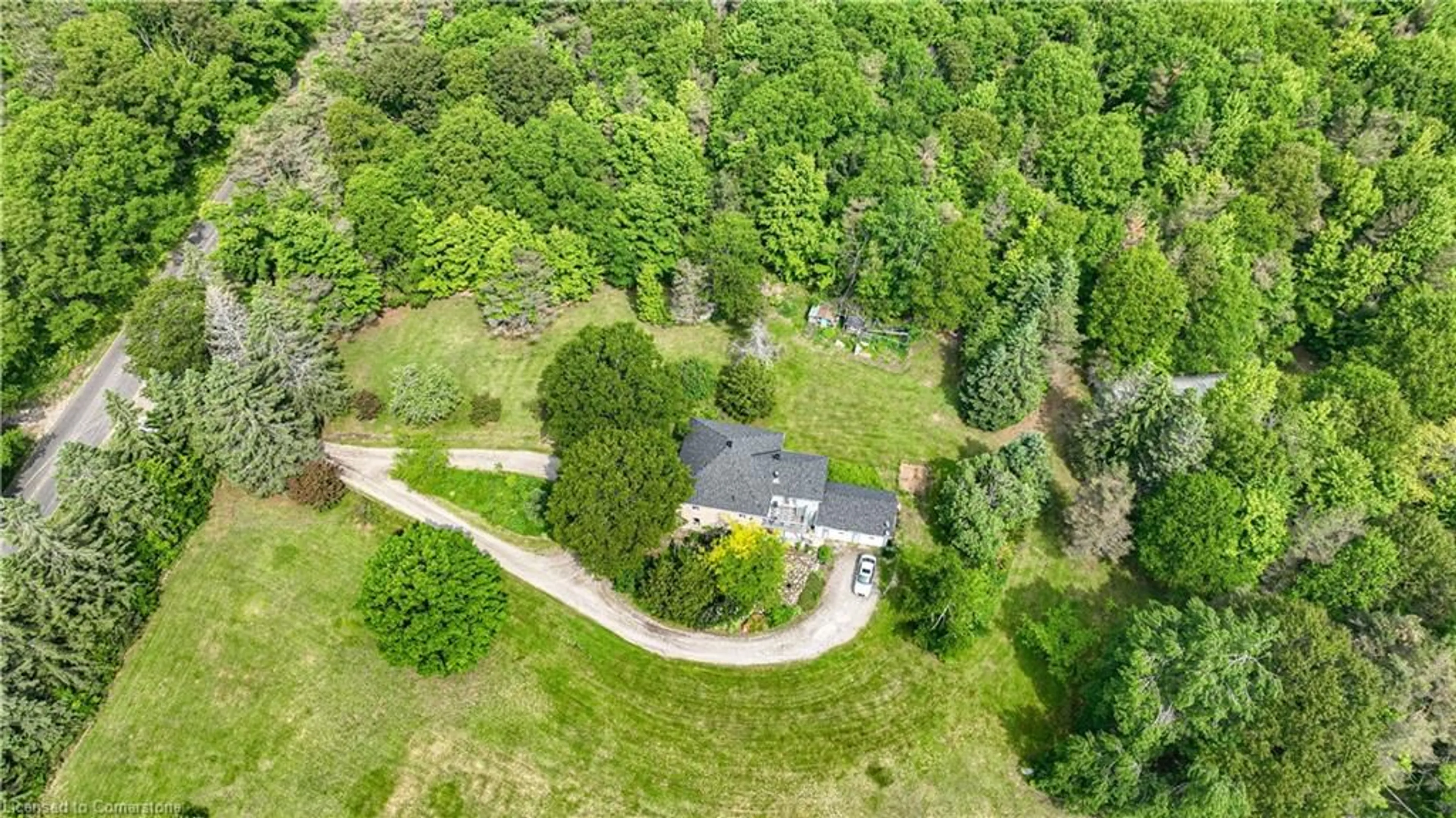 A pic from outside/outdoor area/front of a property/back of a property/a pic from drone, forest/trees view for 5789 4th Line, Hillsdale Ontario L0L 1V0