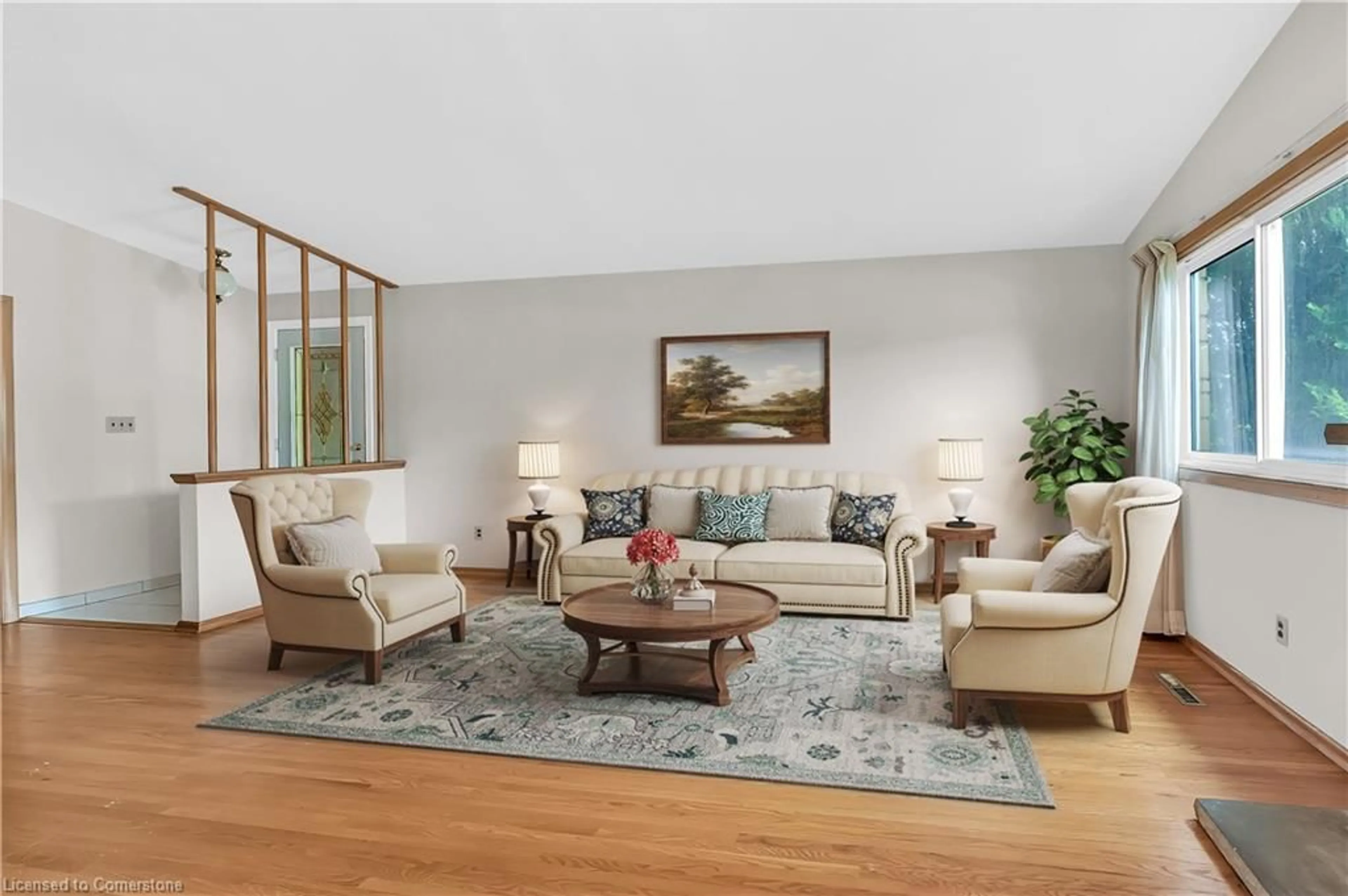 Living room with furniture, wood/laminate floor for 27 San Fernando Dr, Hamilton Ontario L9C 2C1